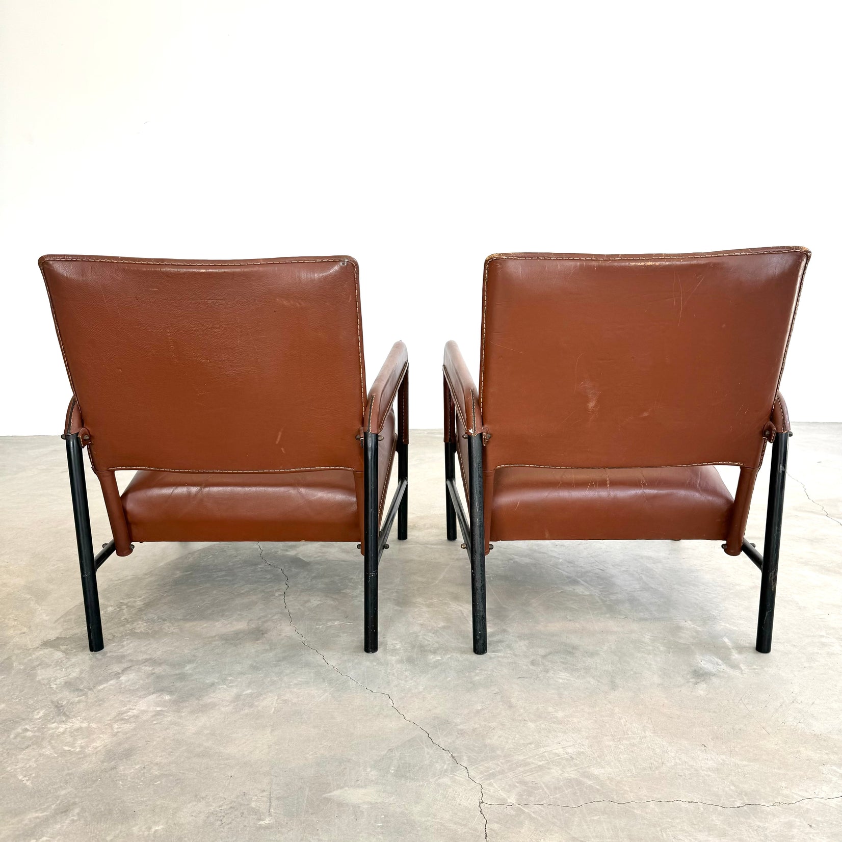 Pair of Saddle Leather and Iron Armchairs