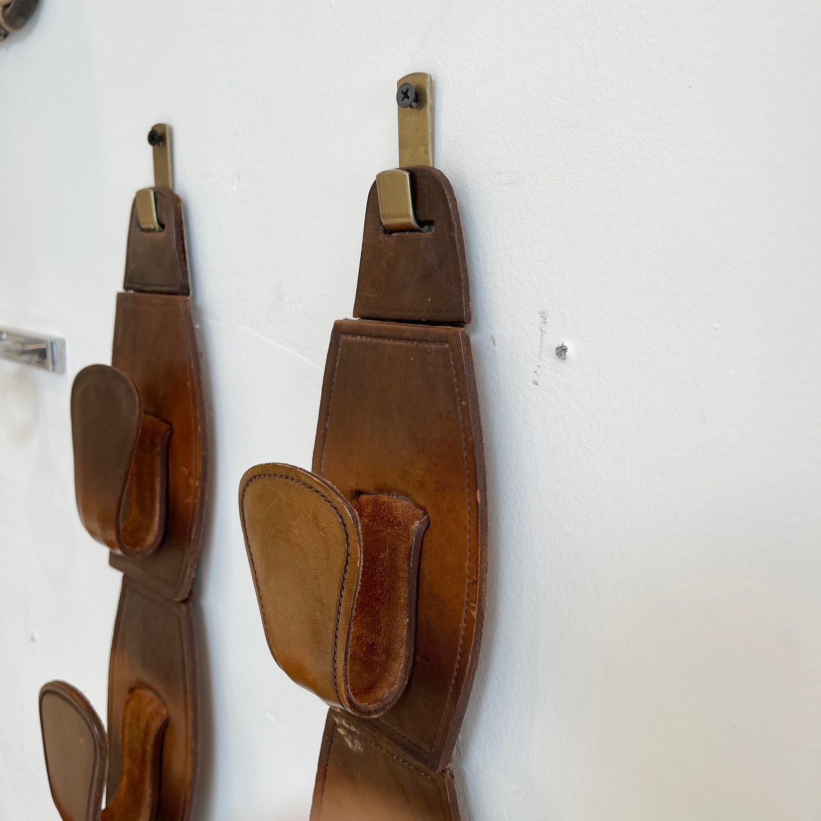 Pair of Jacques Adnet Style Saddle Leather Wall Hooks