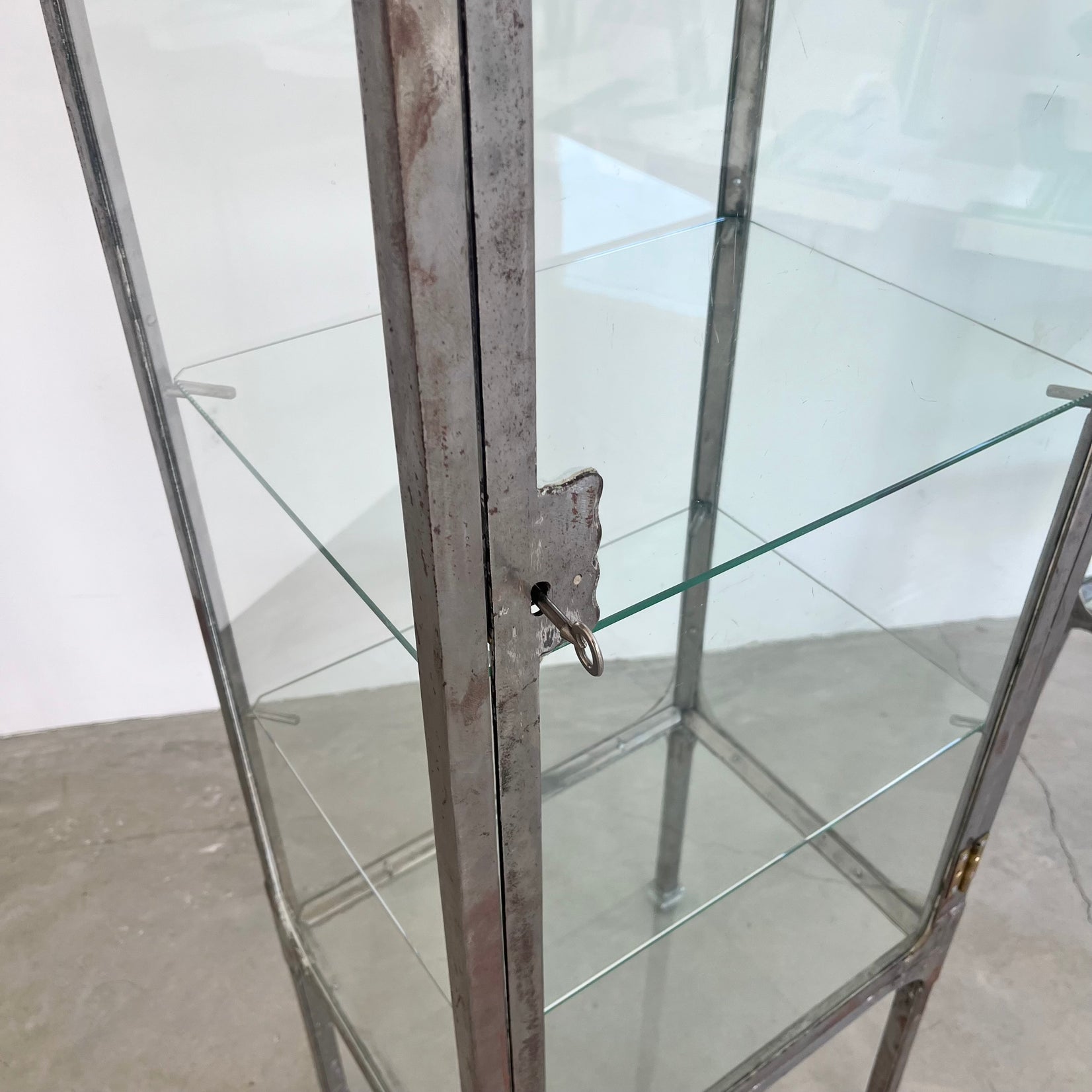 Pair of Matching Steel and Glass Vitrines