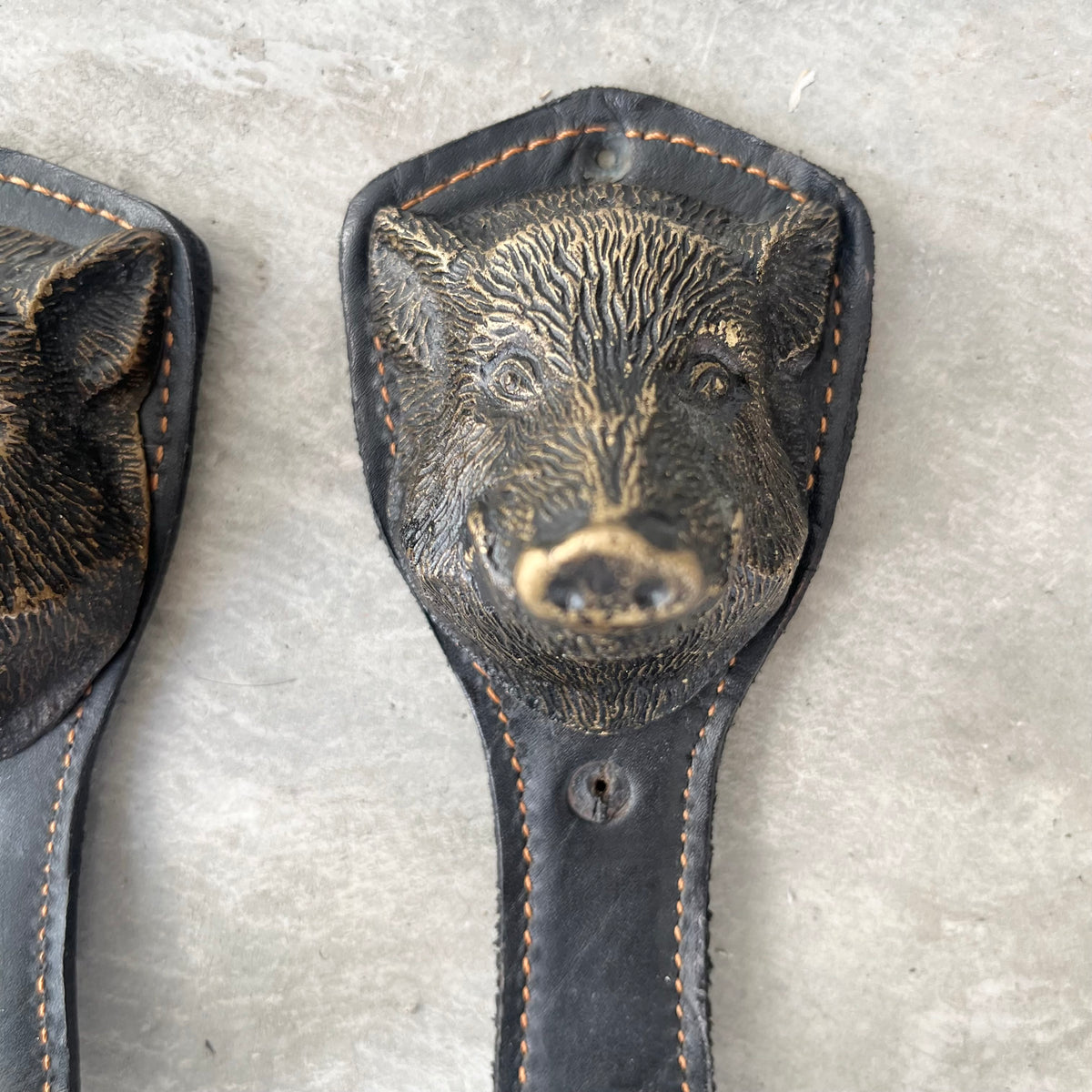 Bronze and Leather Boar Head Wall Hooks