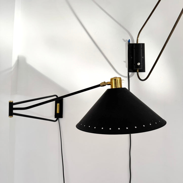 Articulating Sconce by Rene Mathieu