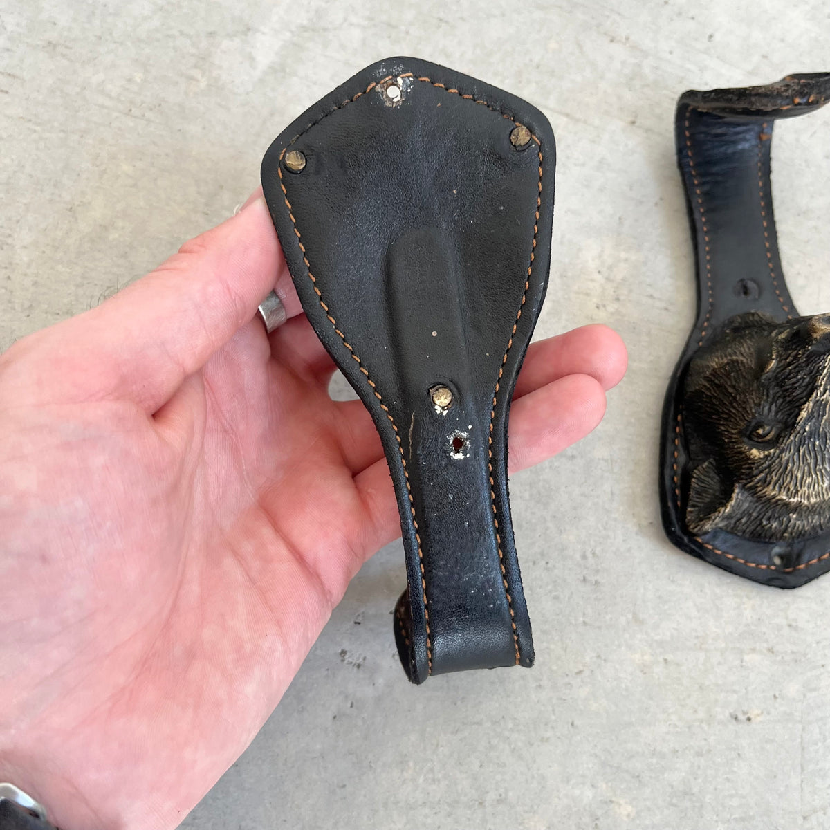 Bronze and Leather Boar Head Wall Hooks