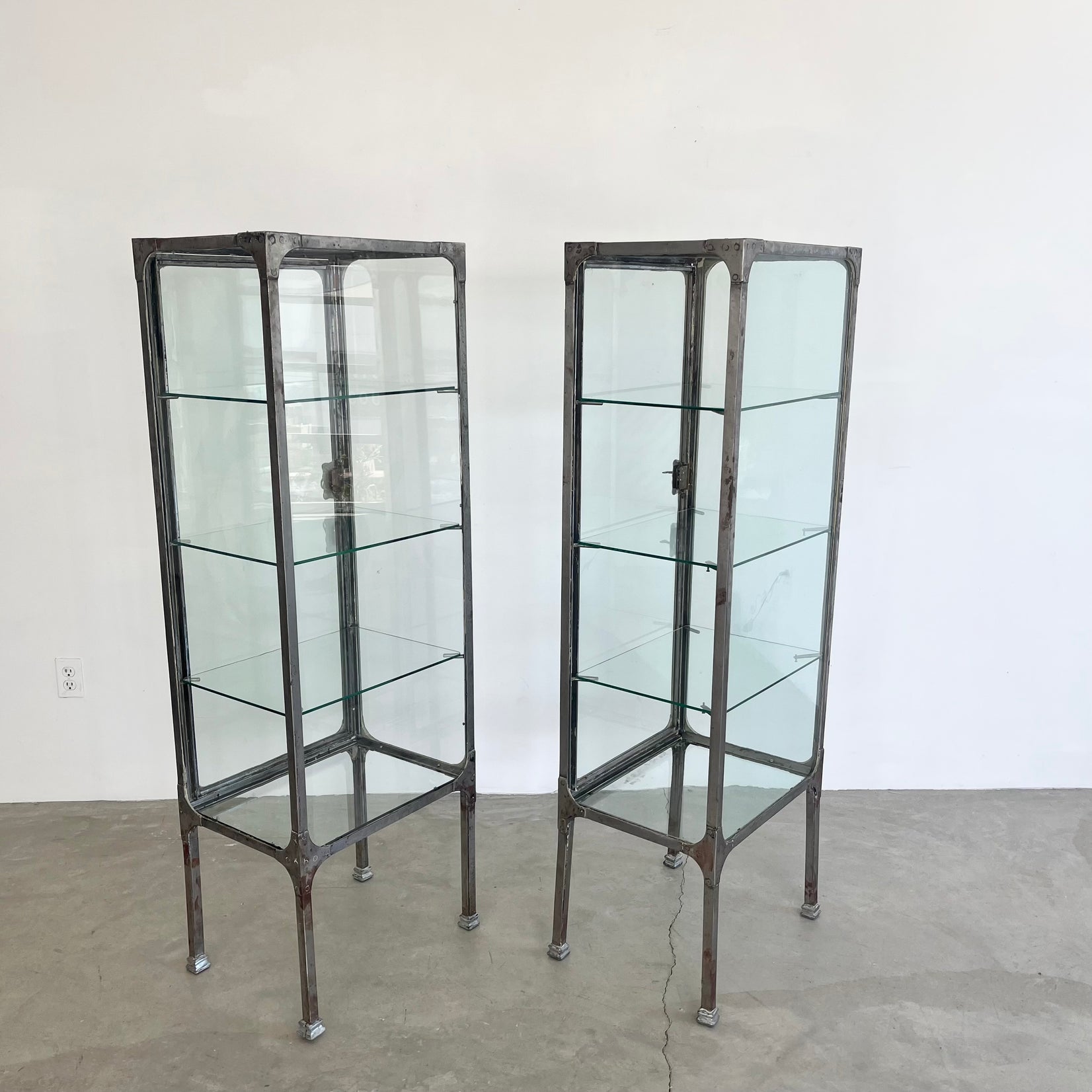 Pair of Matching Steel and Glass Vitrines