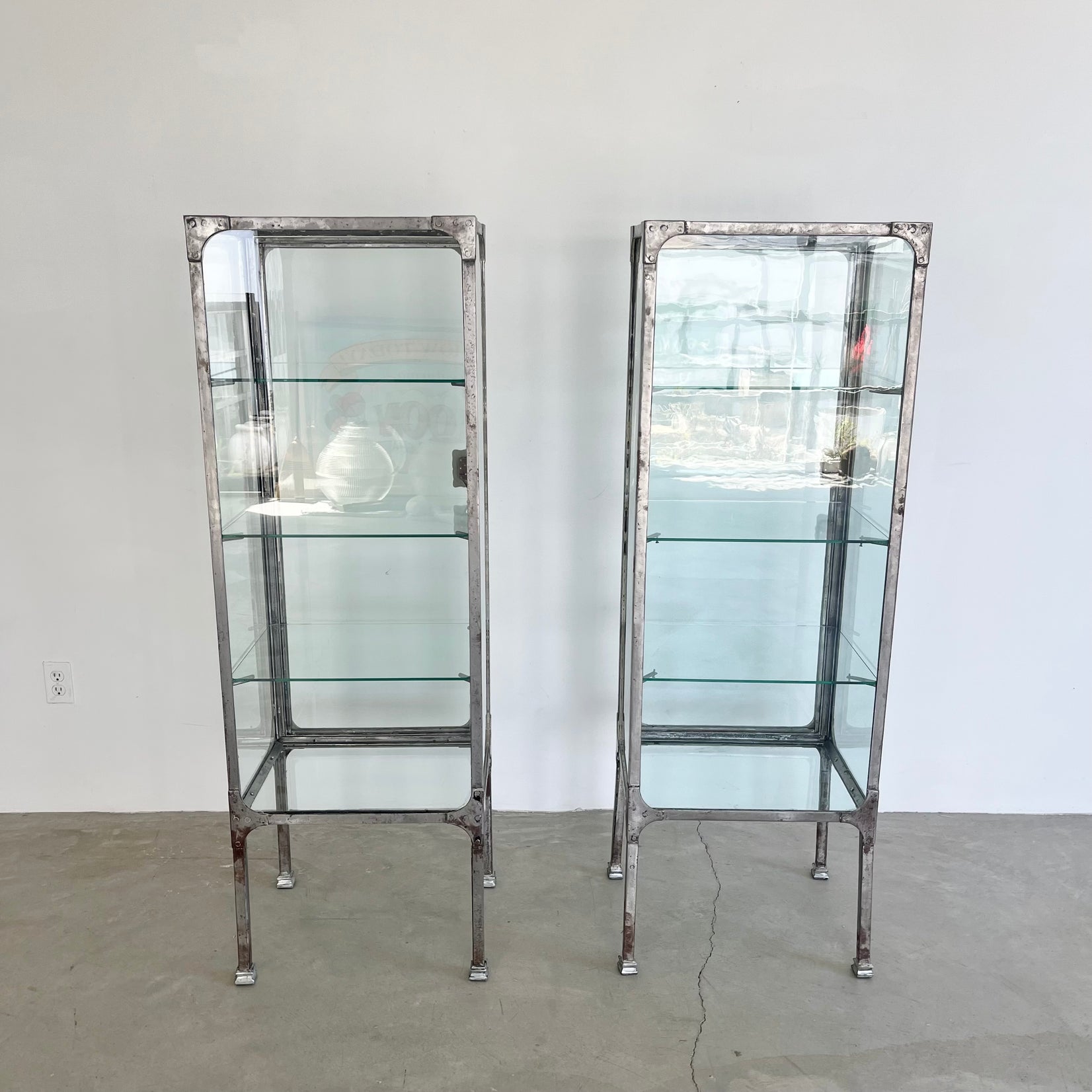 Pair of Matching Steel and Glass Vitrines