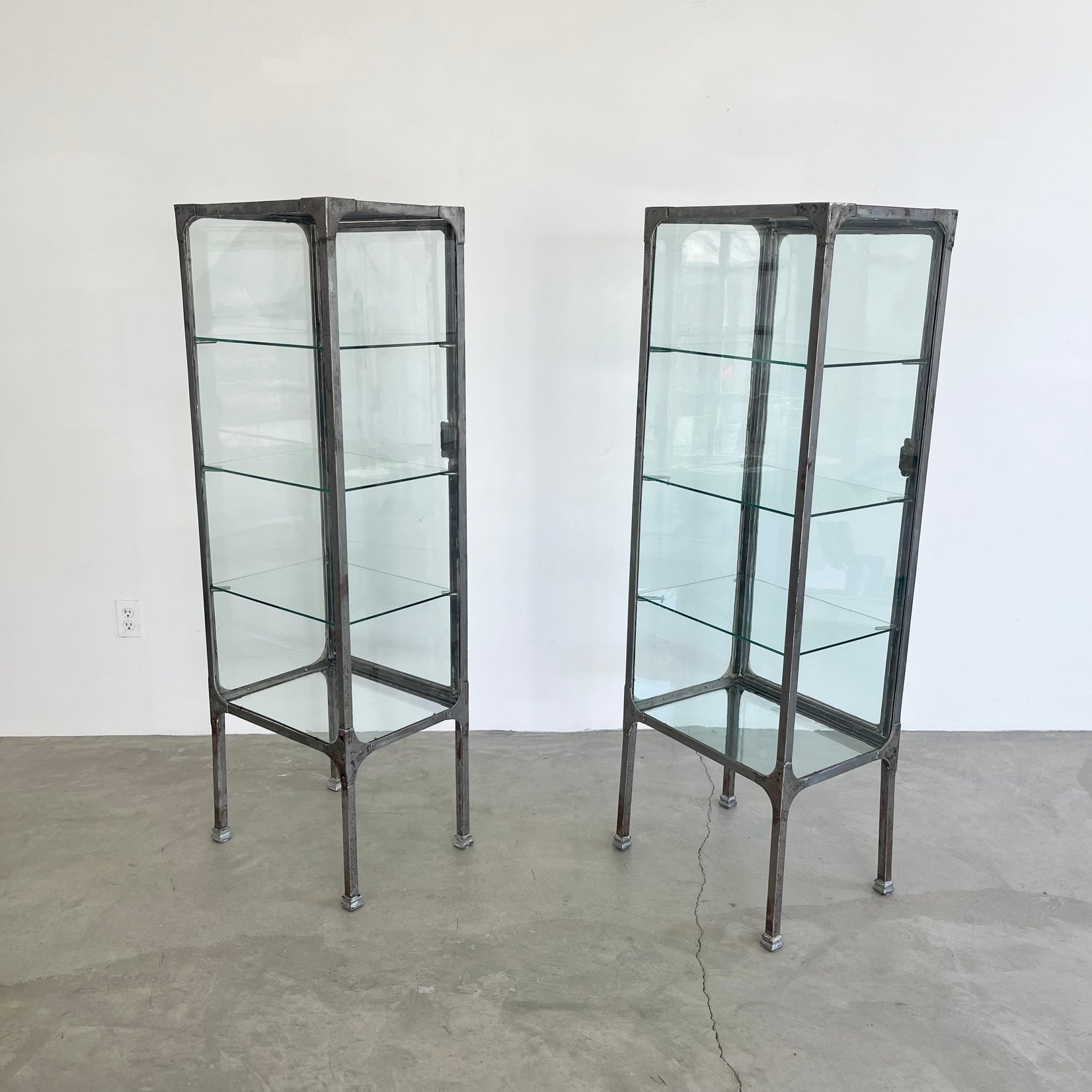 Pair of Matching Steel and Glass Vitrines