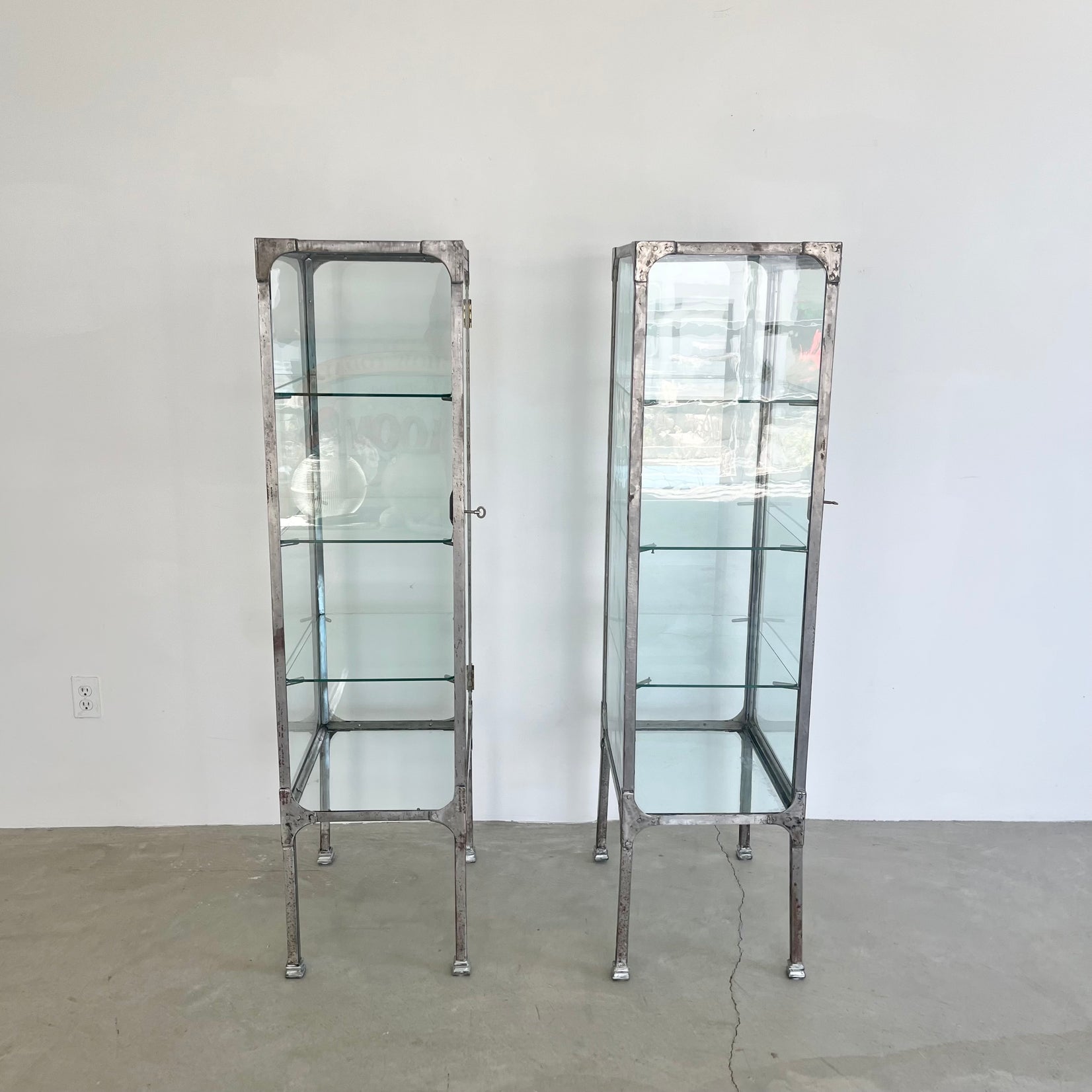 Pair of Matching Steel and Glass Vitrines