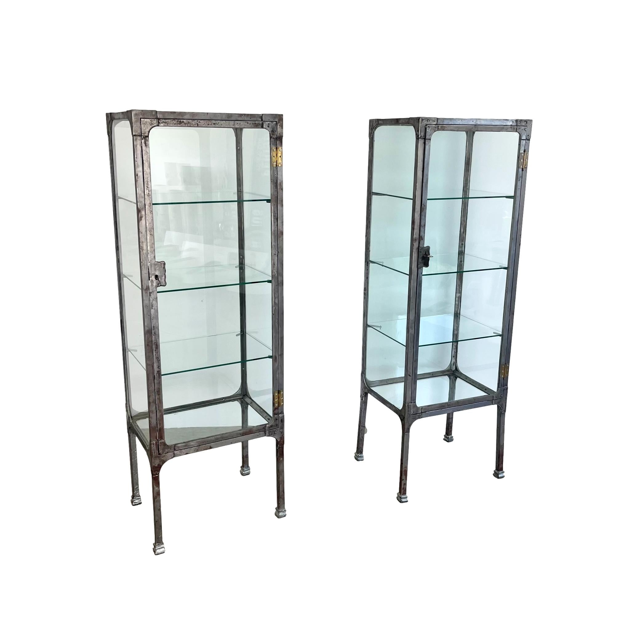 Pair of Matching Steel and Glass Vitrines