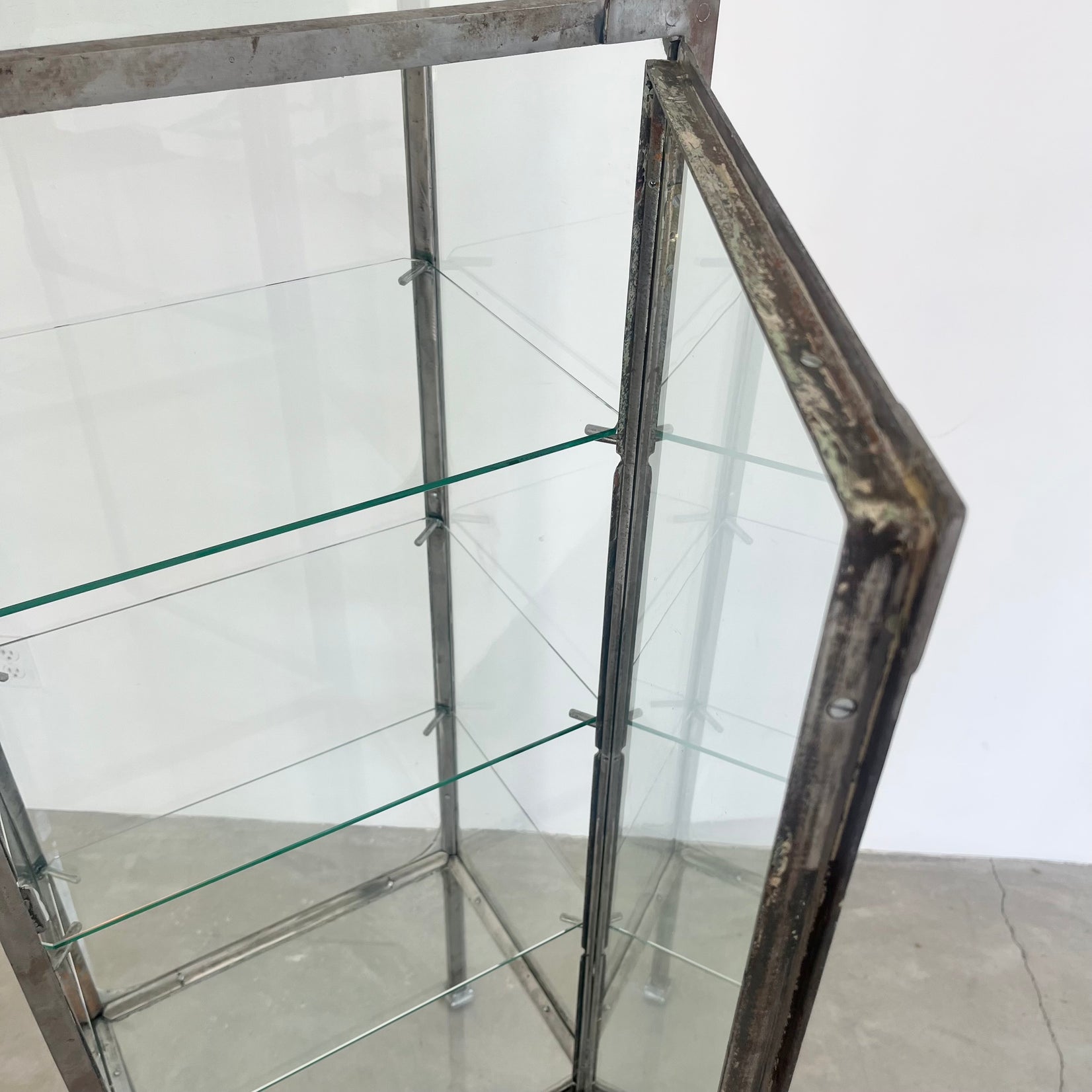 Pair of Matching Steel and Glass Vitrines