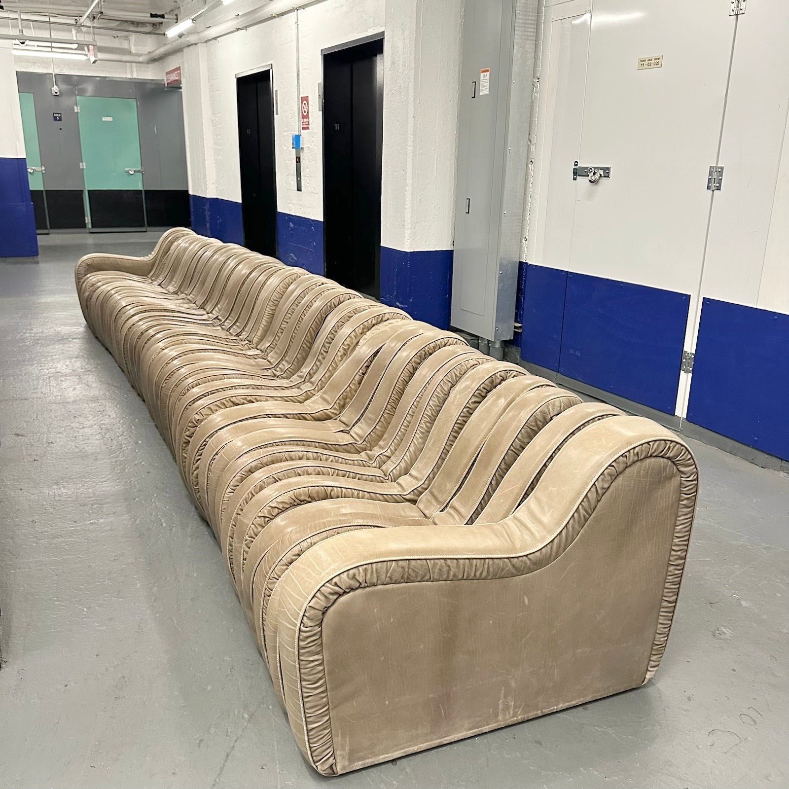 Leather Serpentine Sofa
