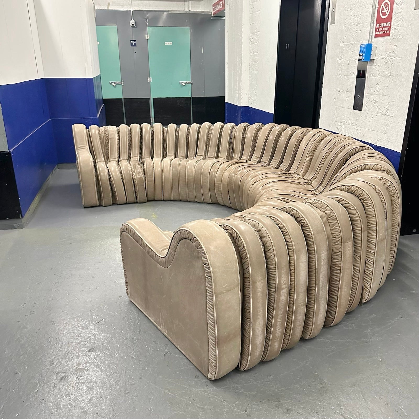 Leather Serpentine Sofa