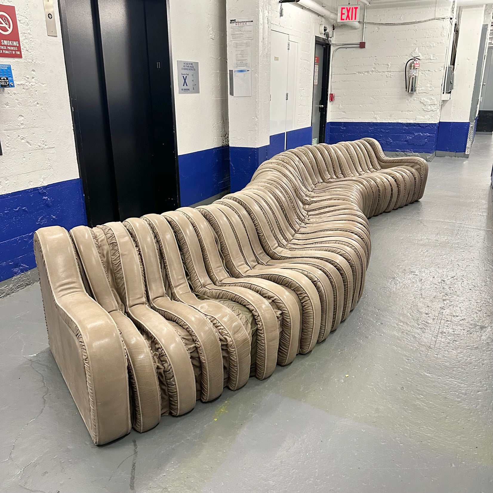 Leather Serpentine Sofa