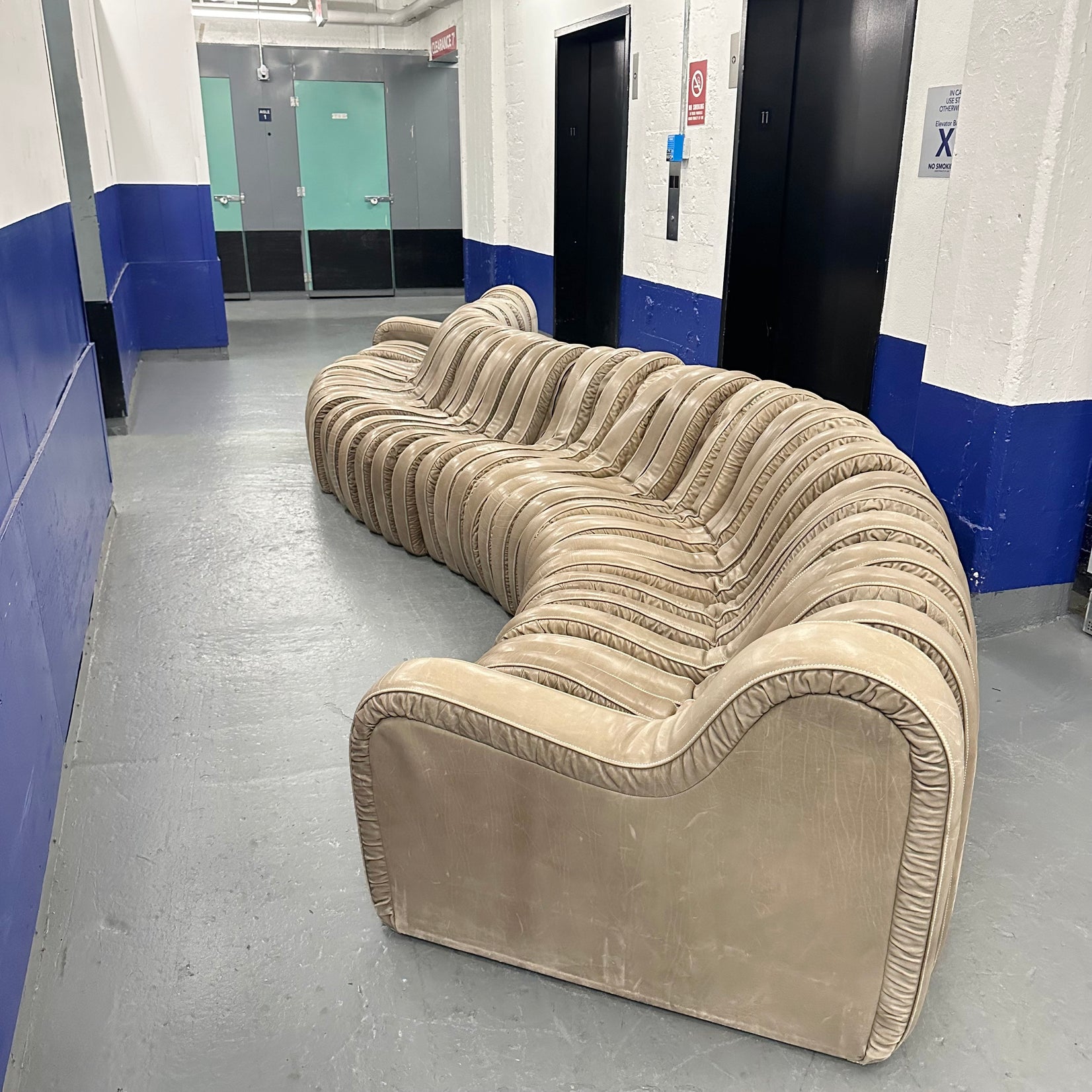 Leather Serpentine Sofa