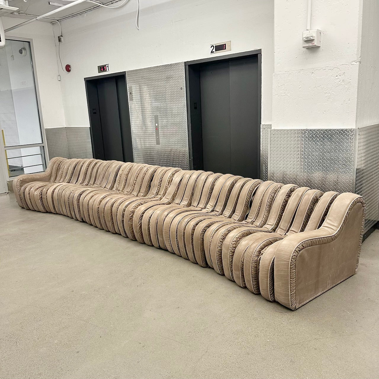 Leather Serpentine Sofa