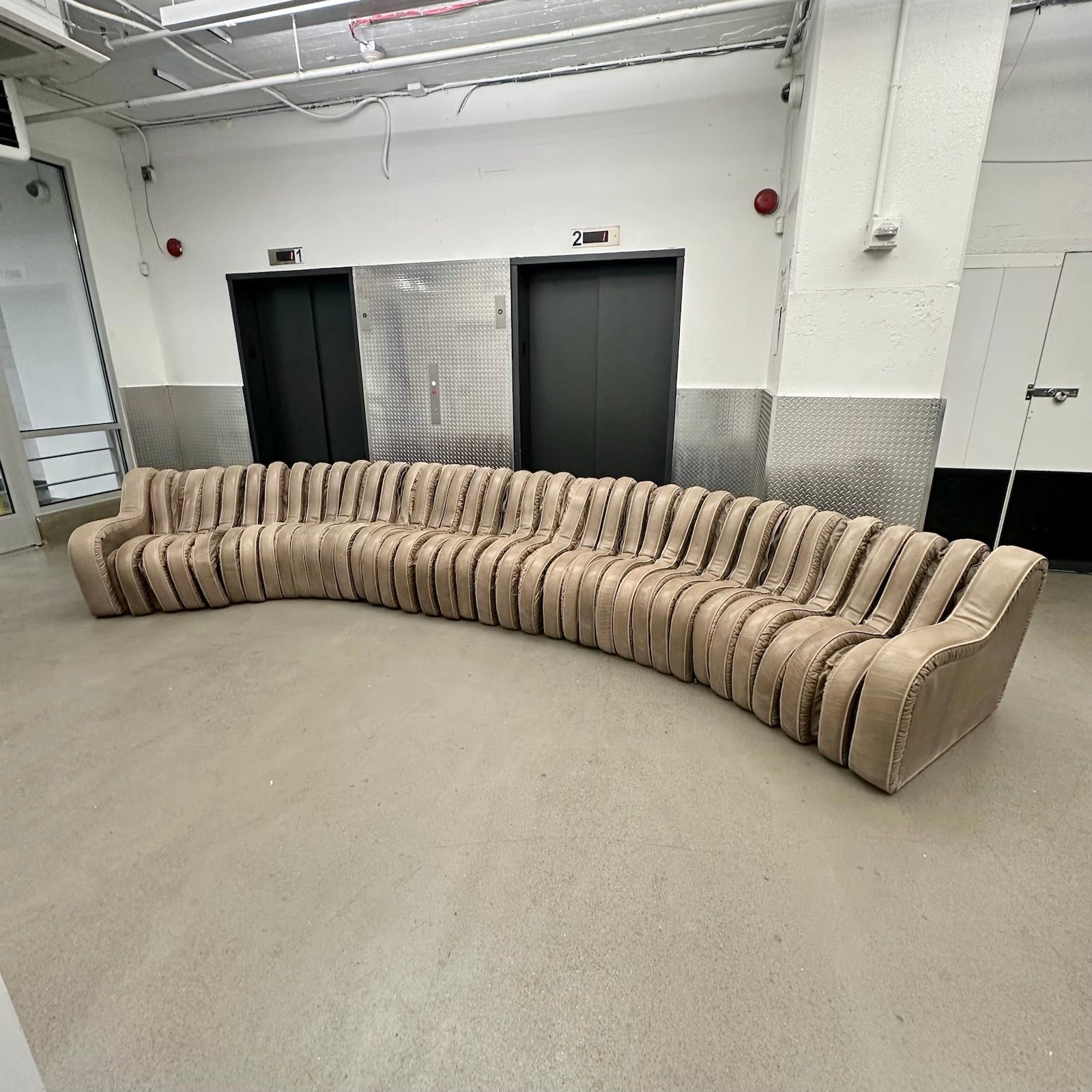 Leather Serpentine Sofa