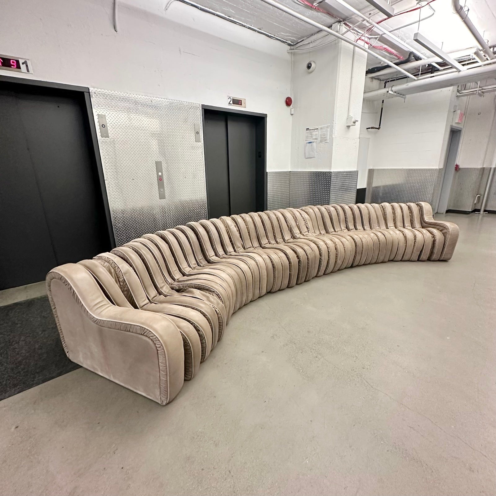 Leather Serpentine Sofa
