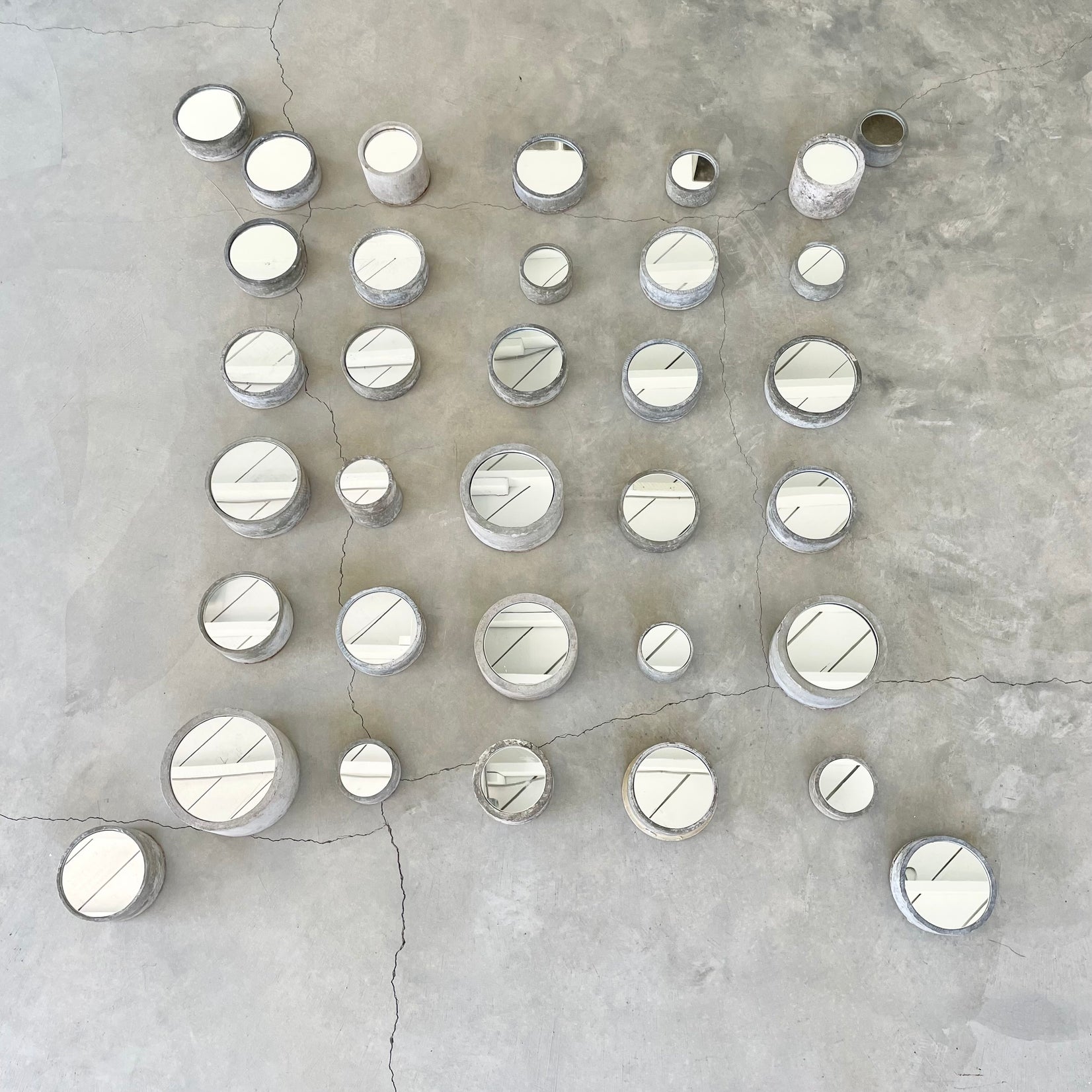 Collection of 34 Willy Guhl Concrete Mirrors, 1960s Switzerland