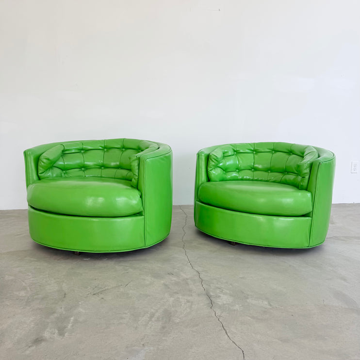 Pair of Green Vinyl Swivel Chairs