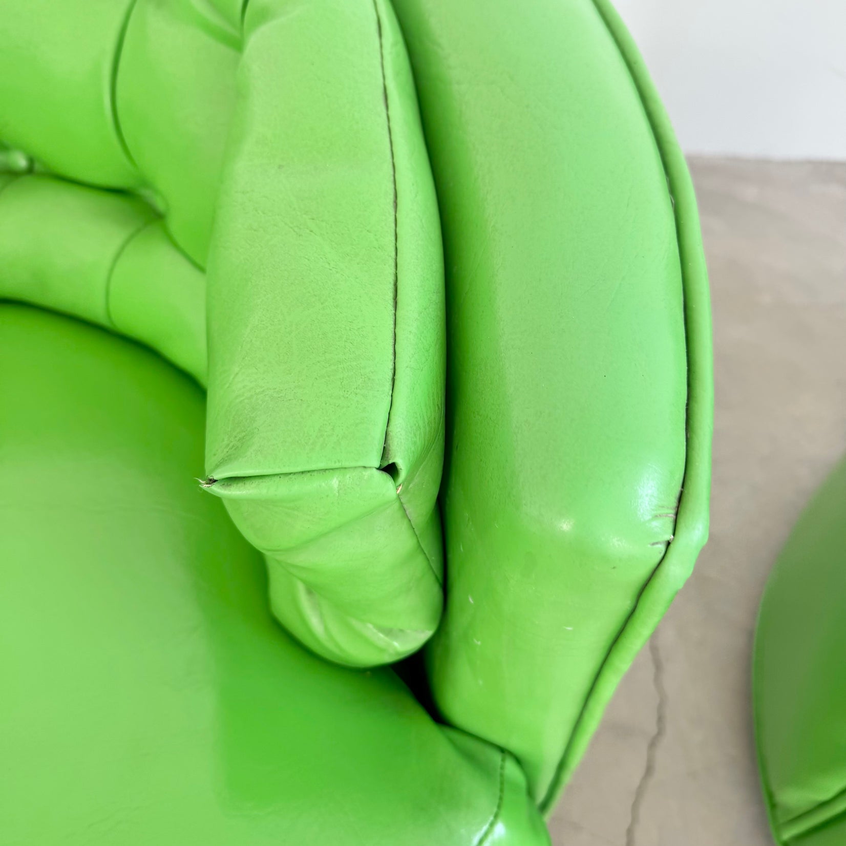 Pair of Green Vinyl Swivel Chairs
