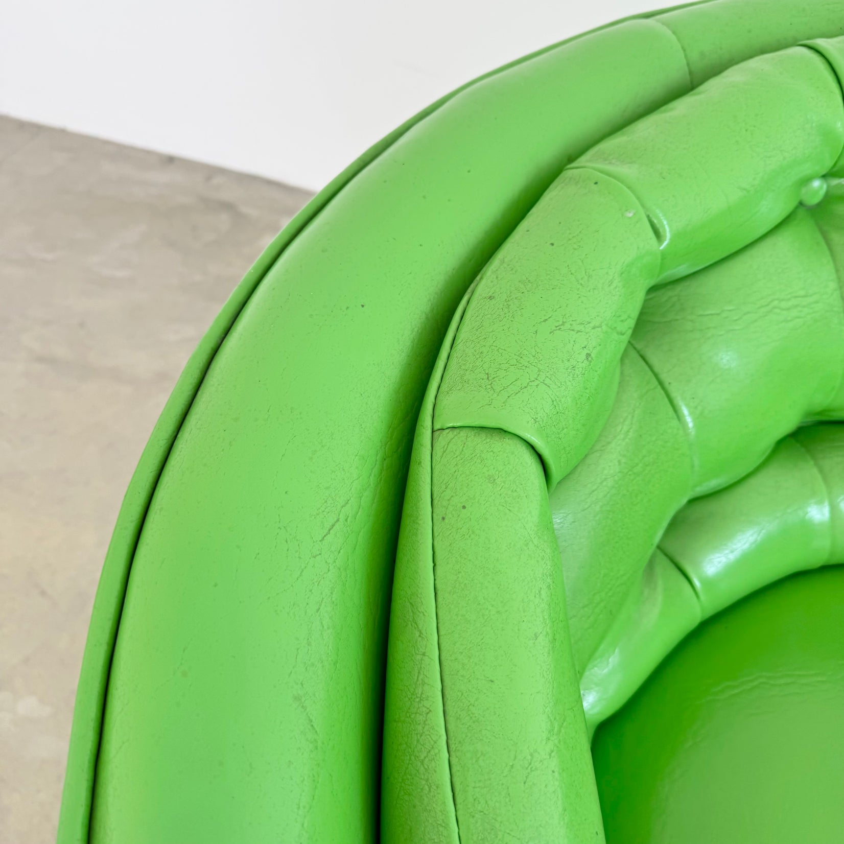 Pair of Green Vinyl Swivel Chairs
