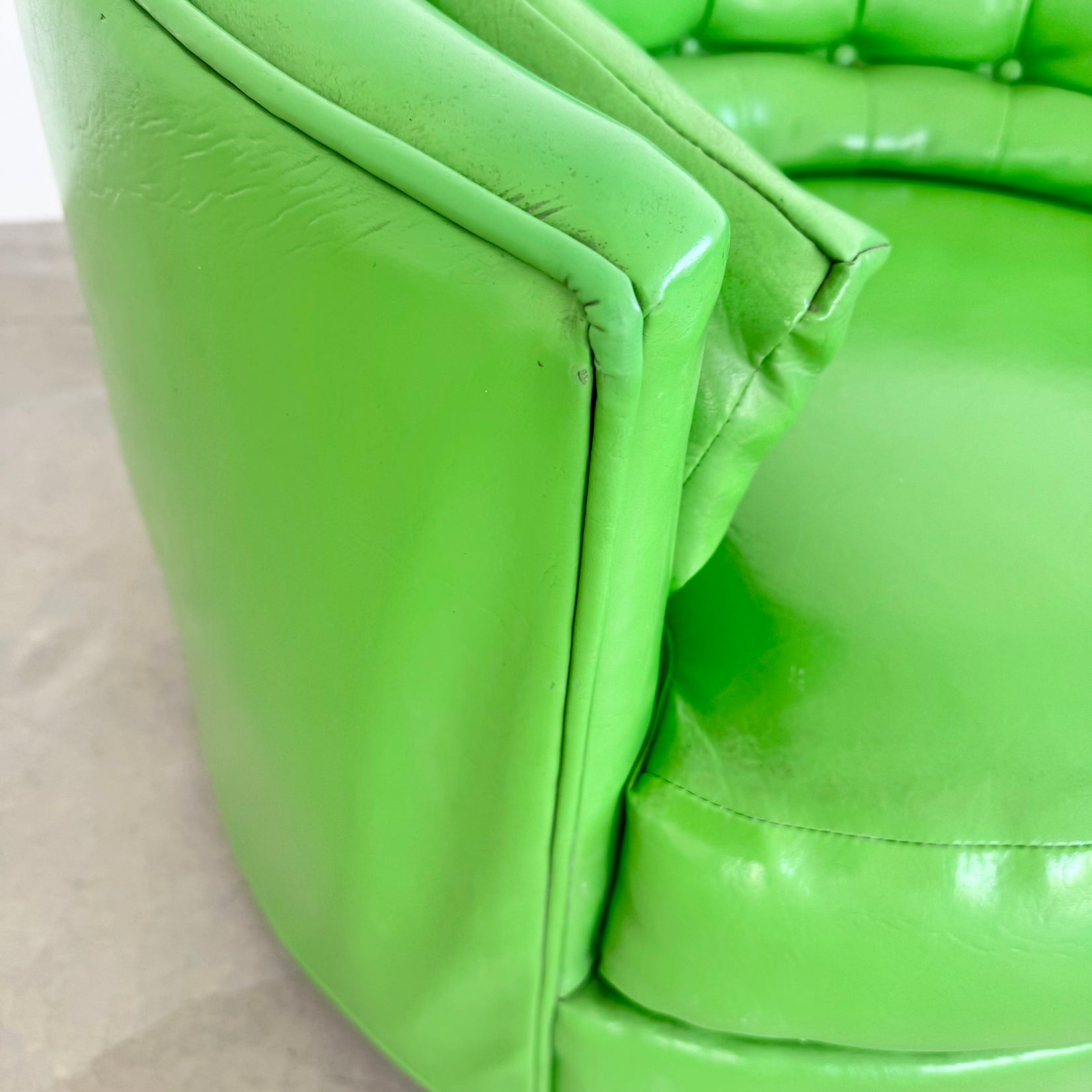 Pair of Green Vinyl Swivel Chairs