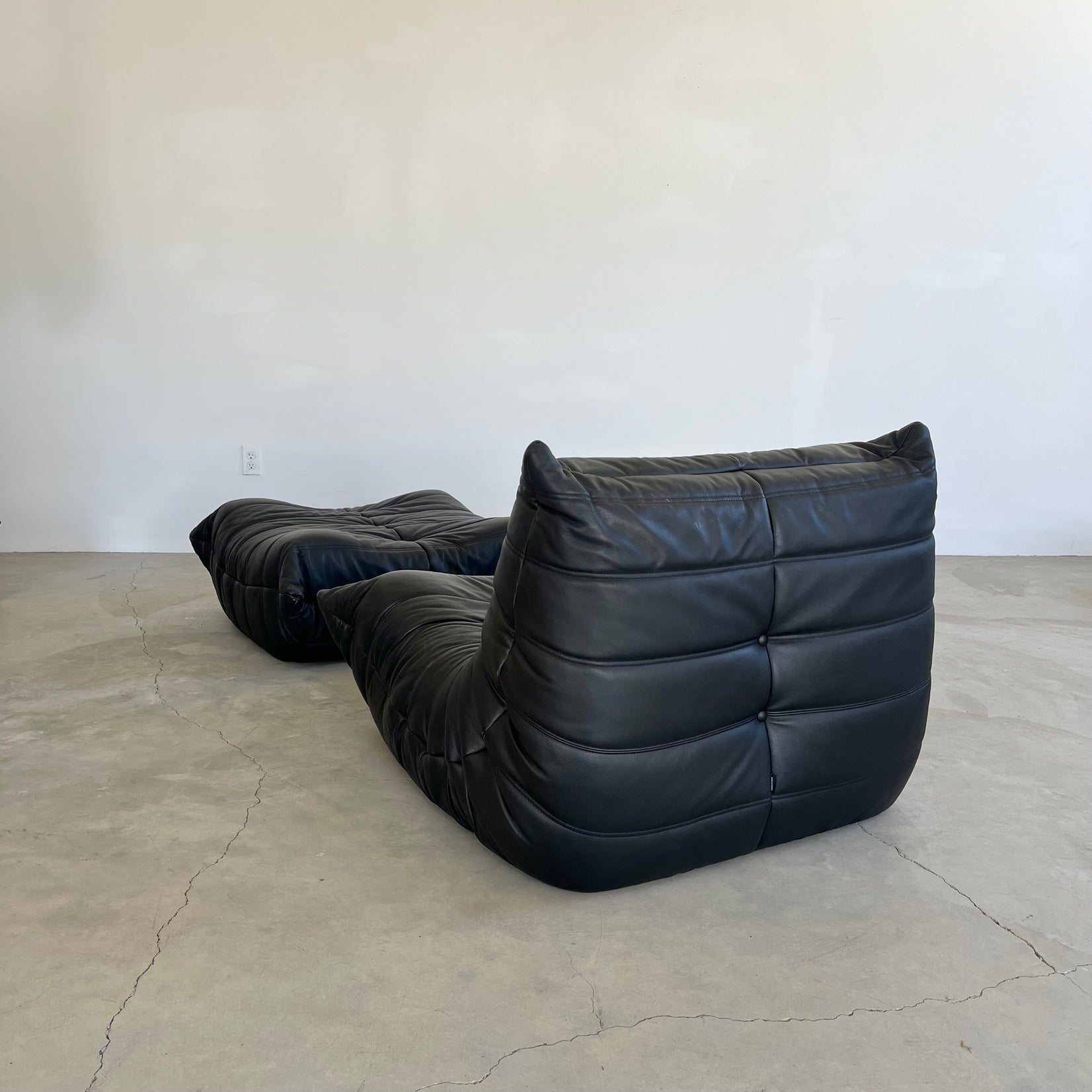 Black leather Fireside Togo Seat & Ottoman