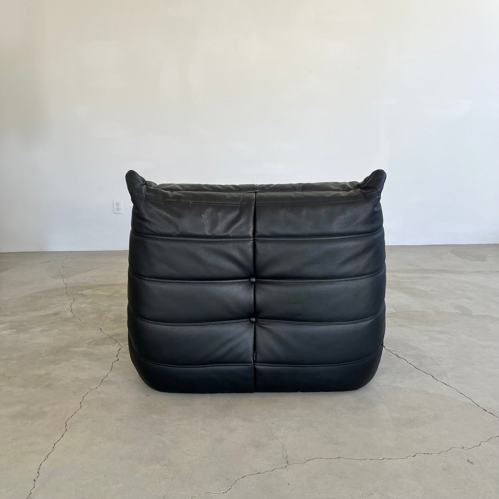 Black leather Fireside Togo Seat & Ottoman