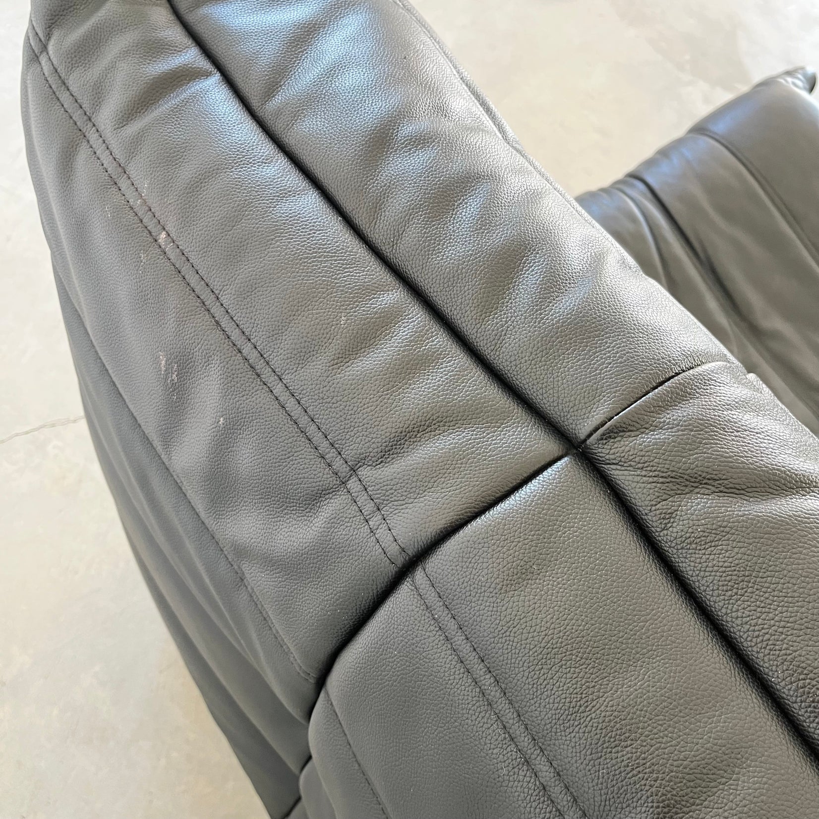 Black leather Fireside Togo Seat & Ottoman