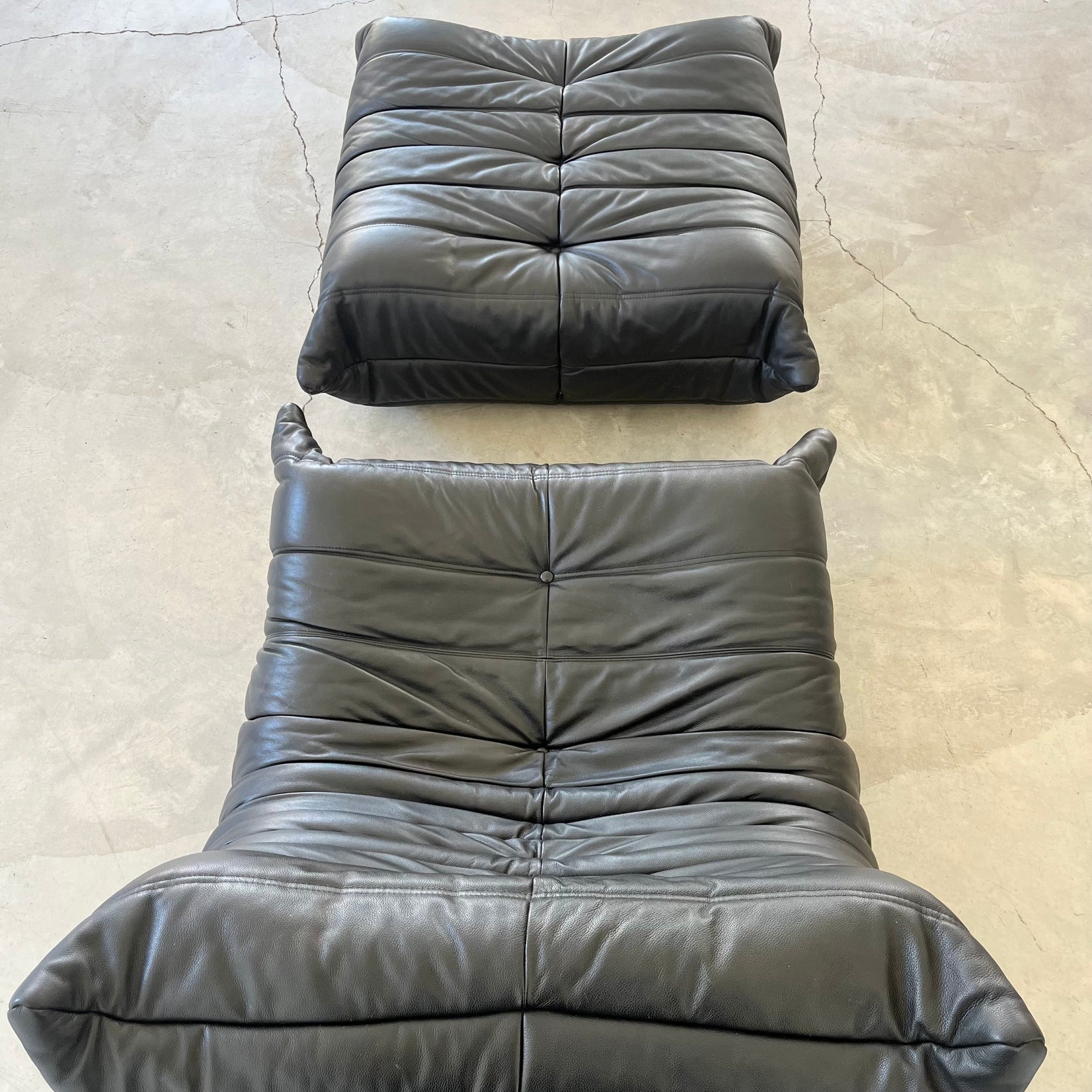 Black leather Fireside Togo Seat & Ottoman