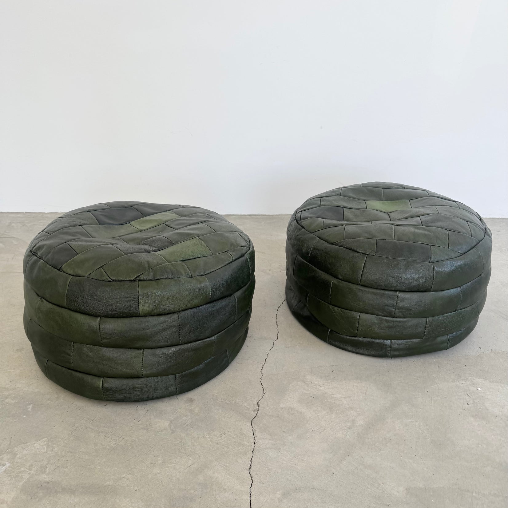 Pair of Green Leather Patchwork Ottomans