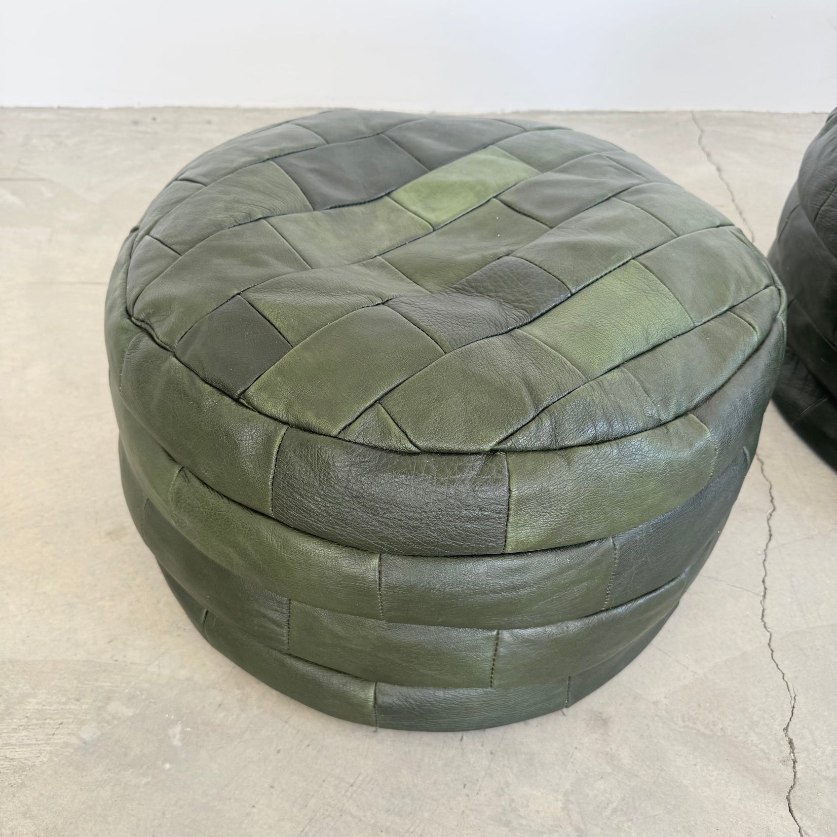 Pair of Green Leather Patchwork Ottomans