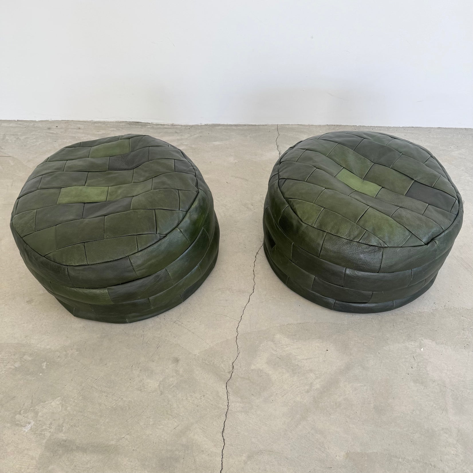 Pair of Green Leather Patchwork Ottomans