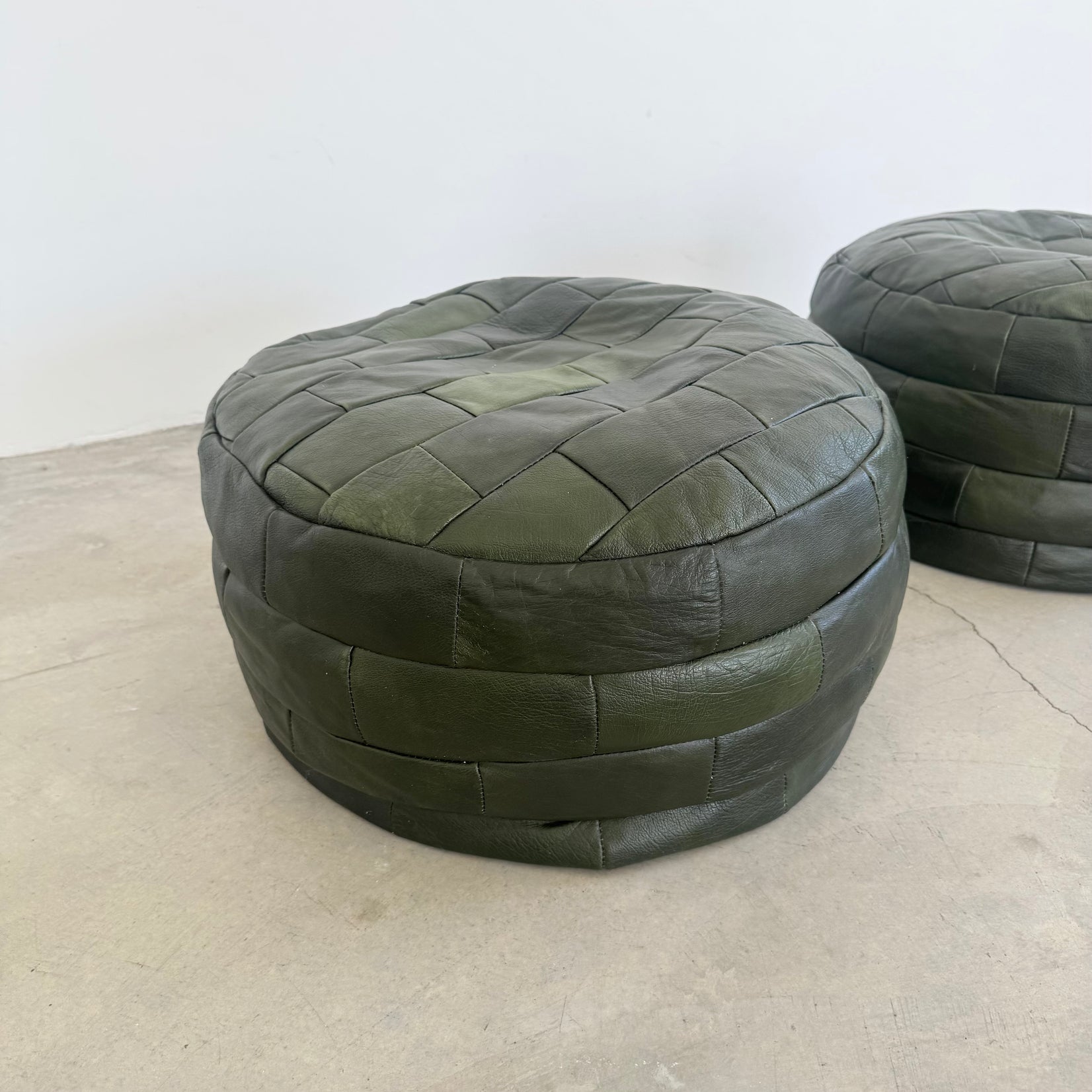 Pair of Green Leather Patchwork Ottomans