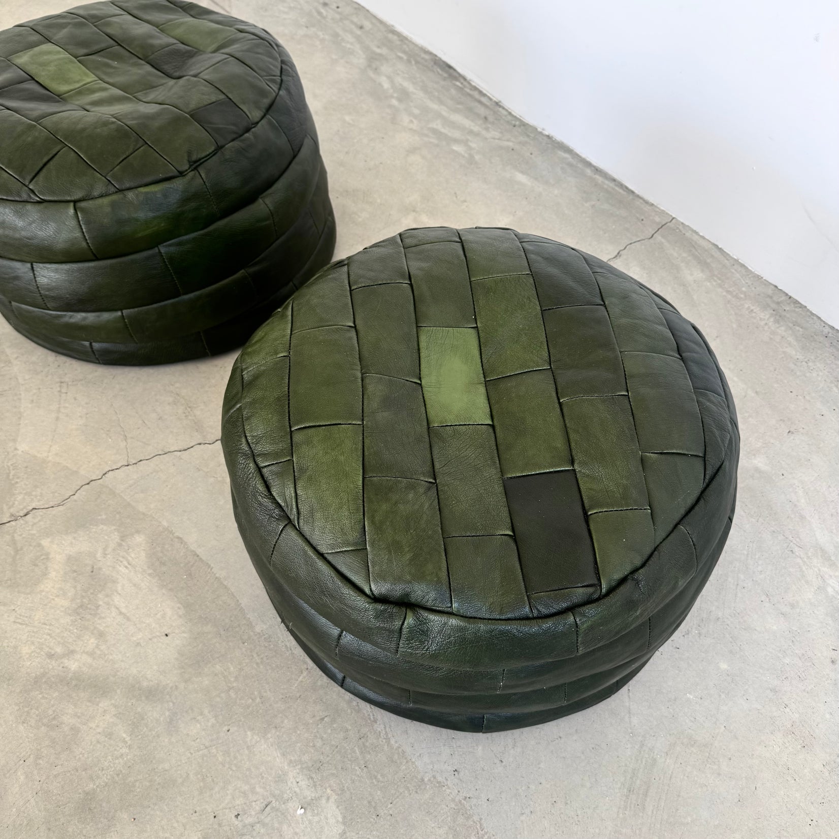 Pair of Green Leather Patchwork Ottomans