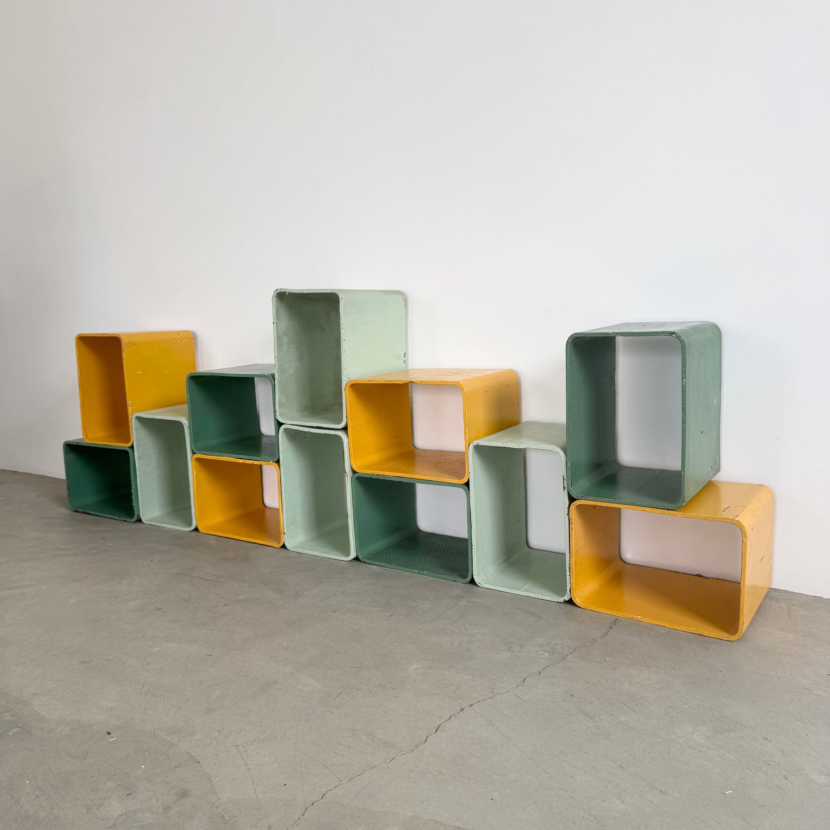 Yellow and Green Modular Concrete Bookcase