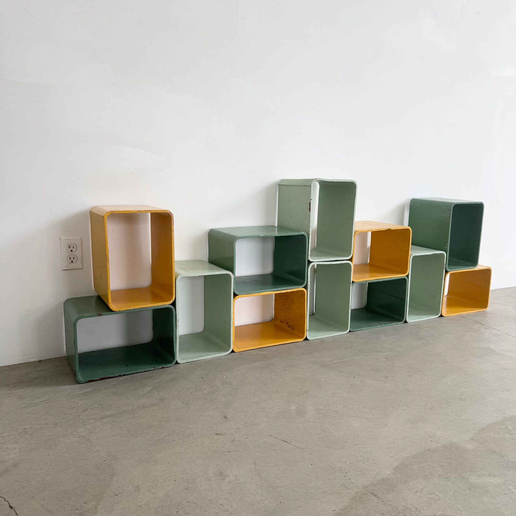 Yellow and Green Modular Concrete Bookcase