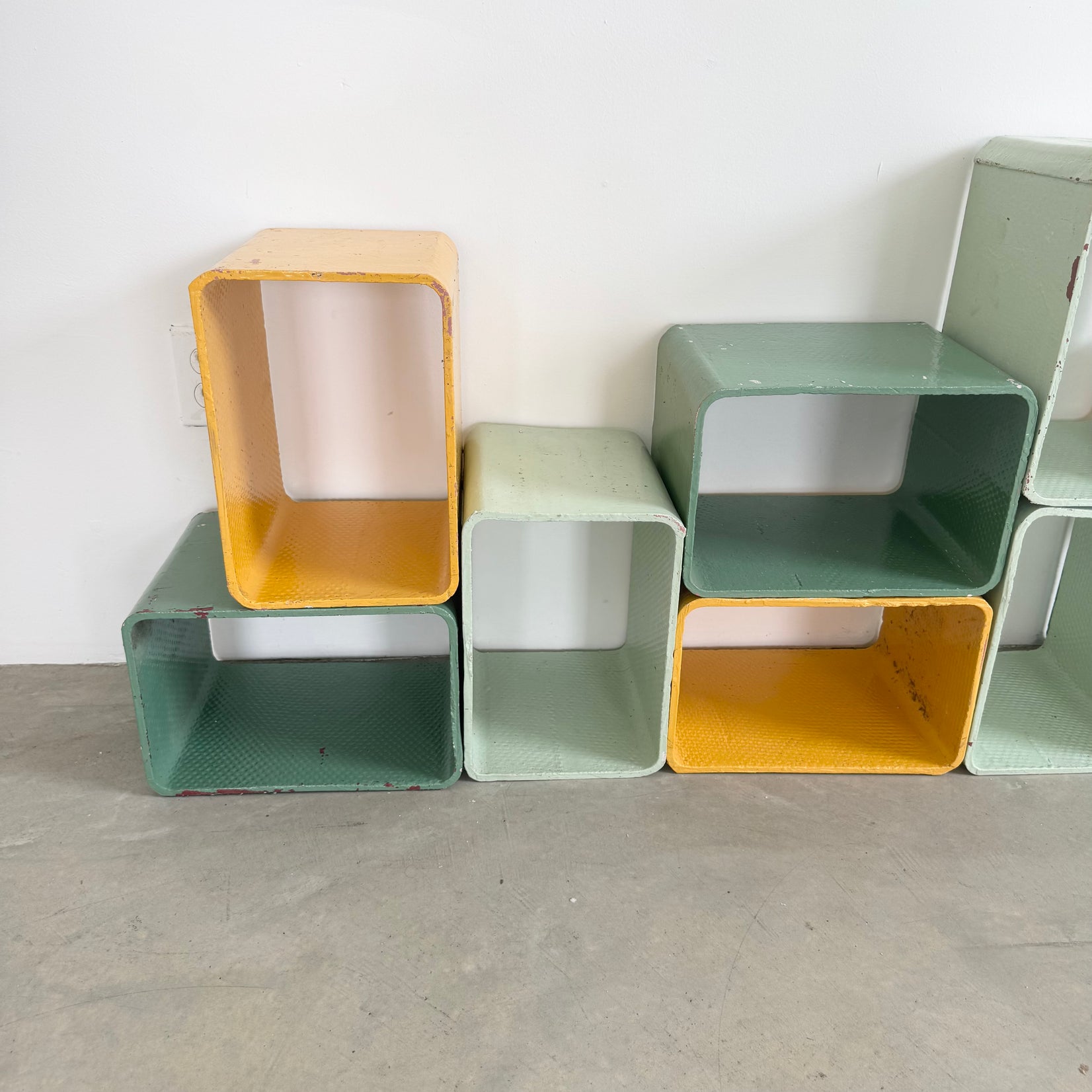 Yellow and Green Modular Concrete Bookcase