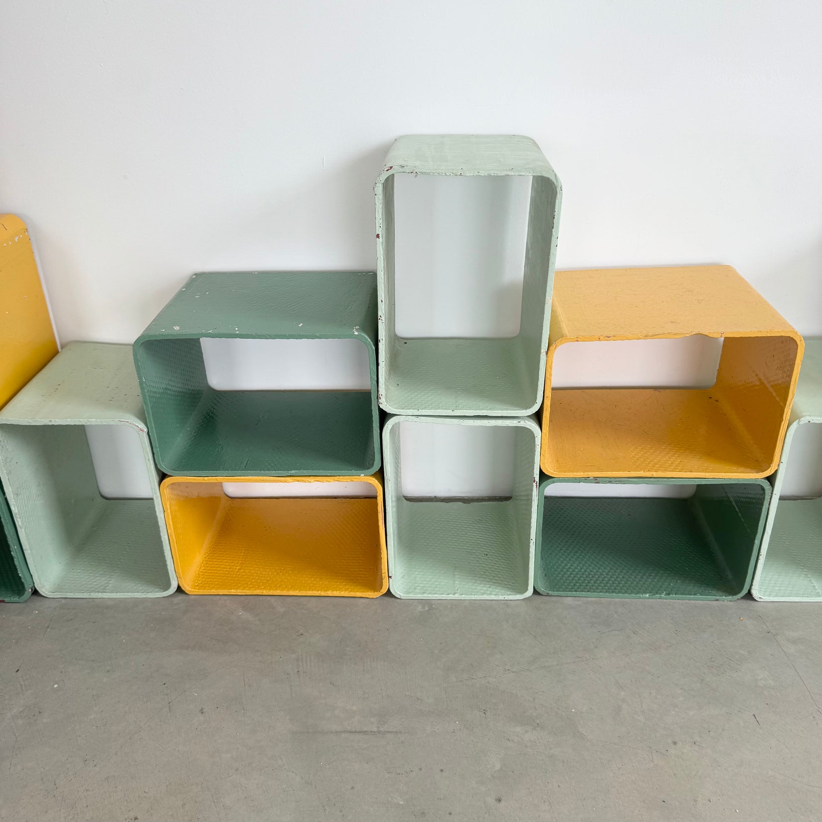 Yellow and Green Modular Concrete Bookcase