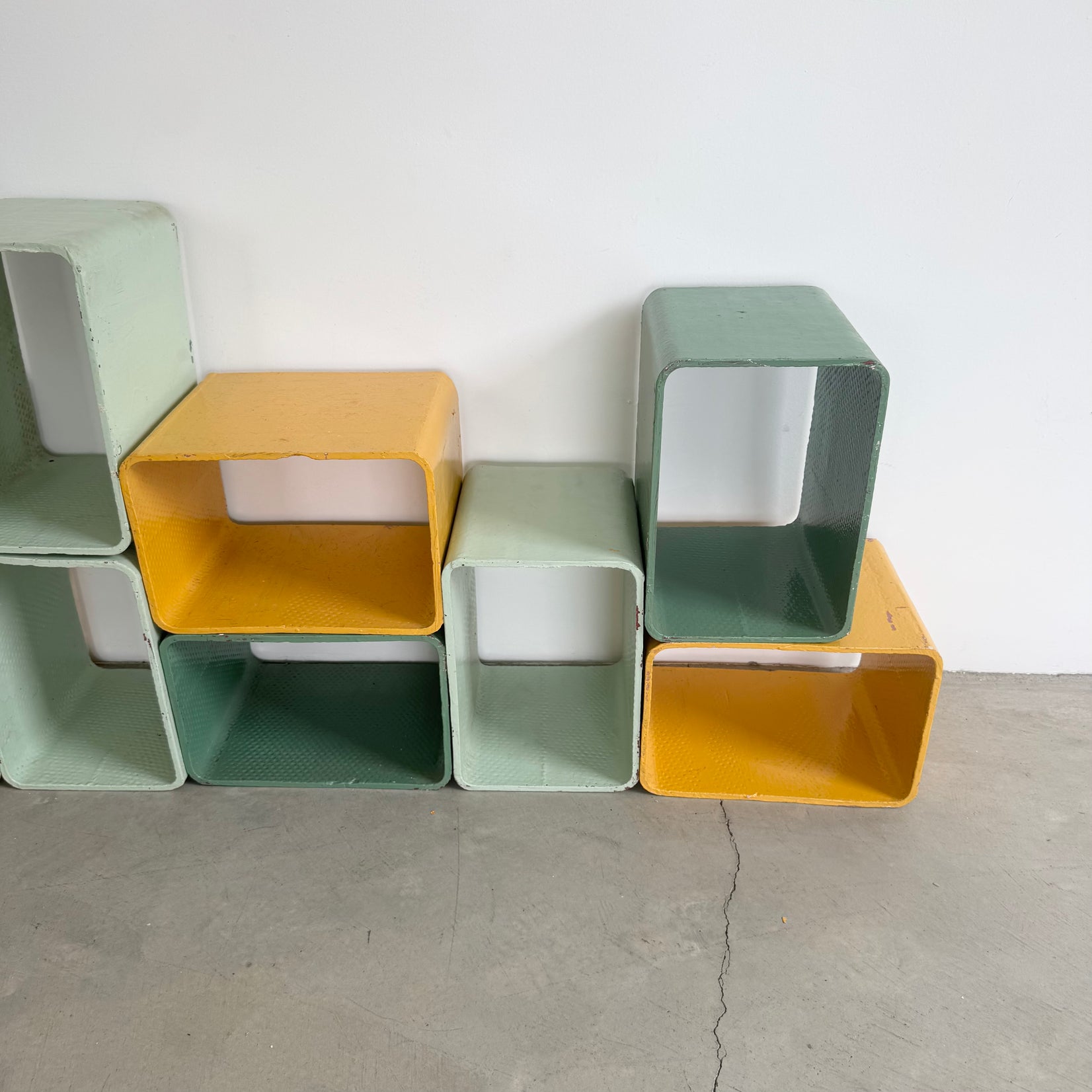 Yellow and Green Modular Concrete Bookcase