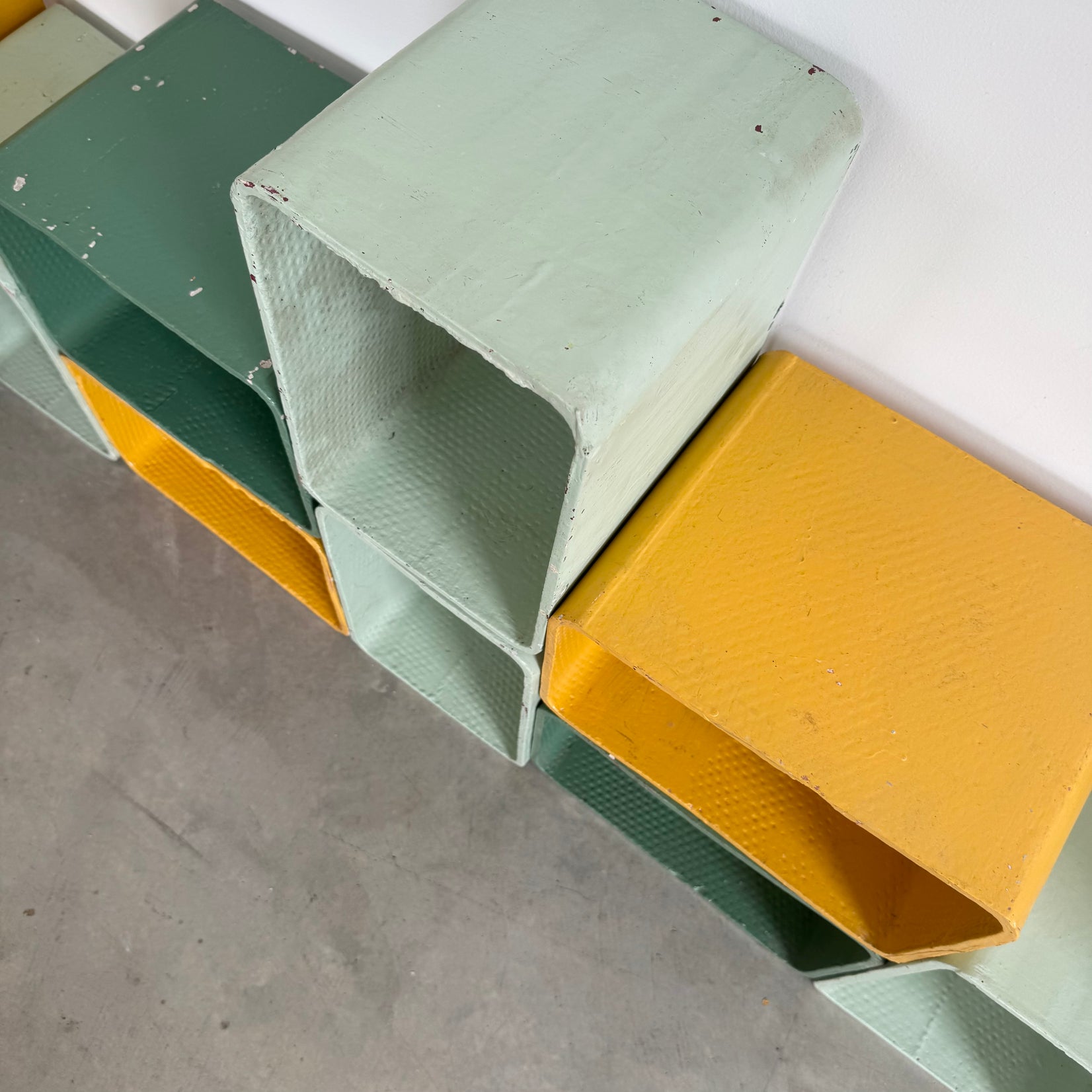 Yellow and Green Modular Concrete Bookcase