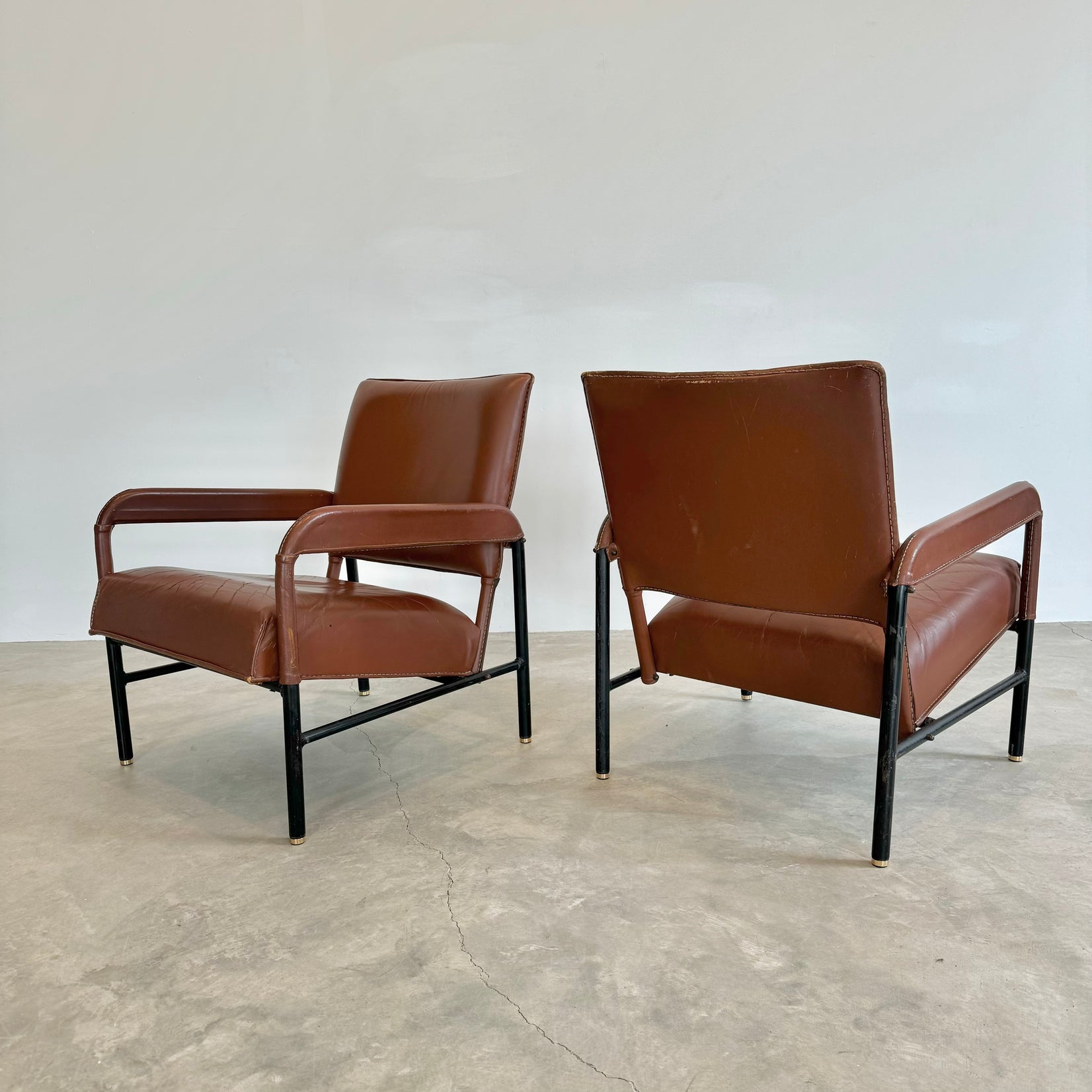 Pair of Saddle Leather and Iron Armchairs