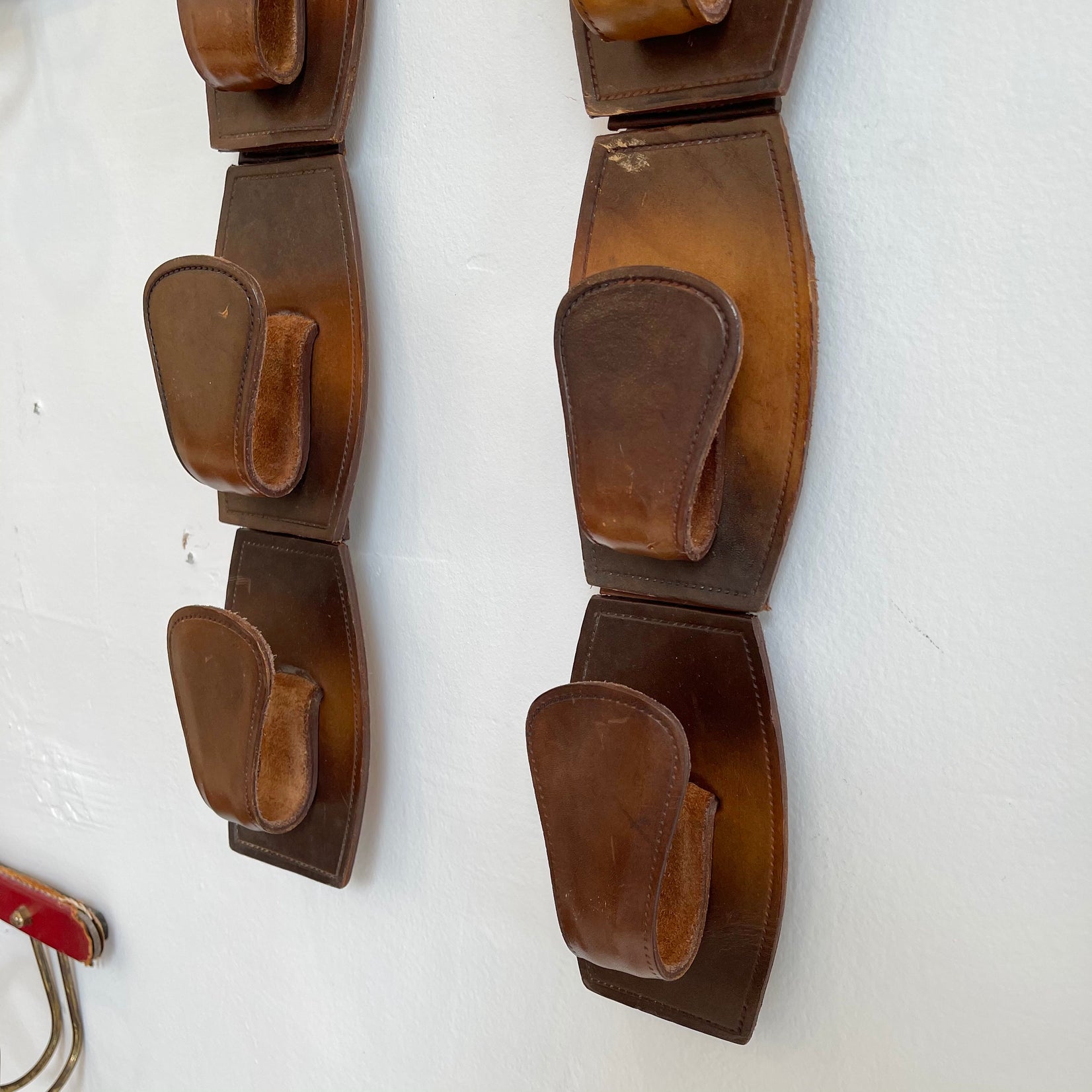 Pair of Jacques Adnet Style Saddle Leather Wall Hooks