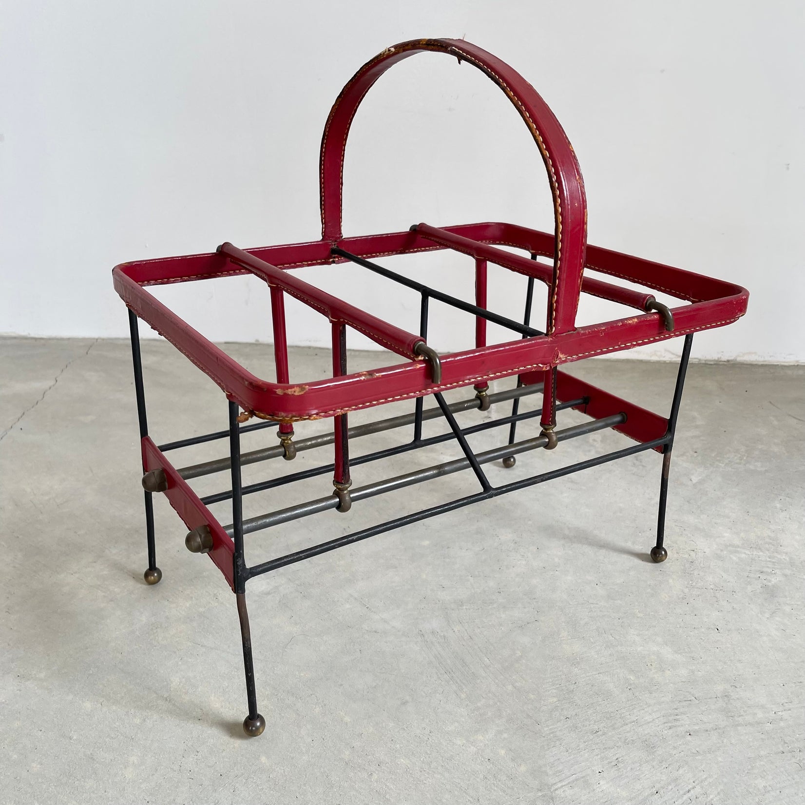 Jacques Adnet Red Leather and Metal Book Rack, 1950s France