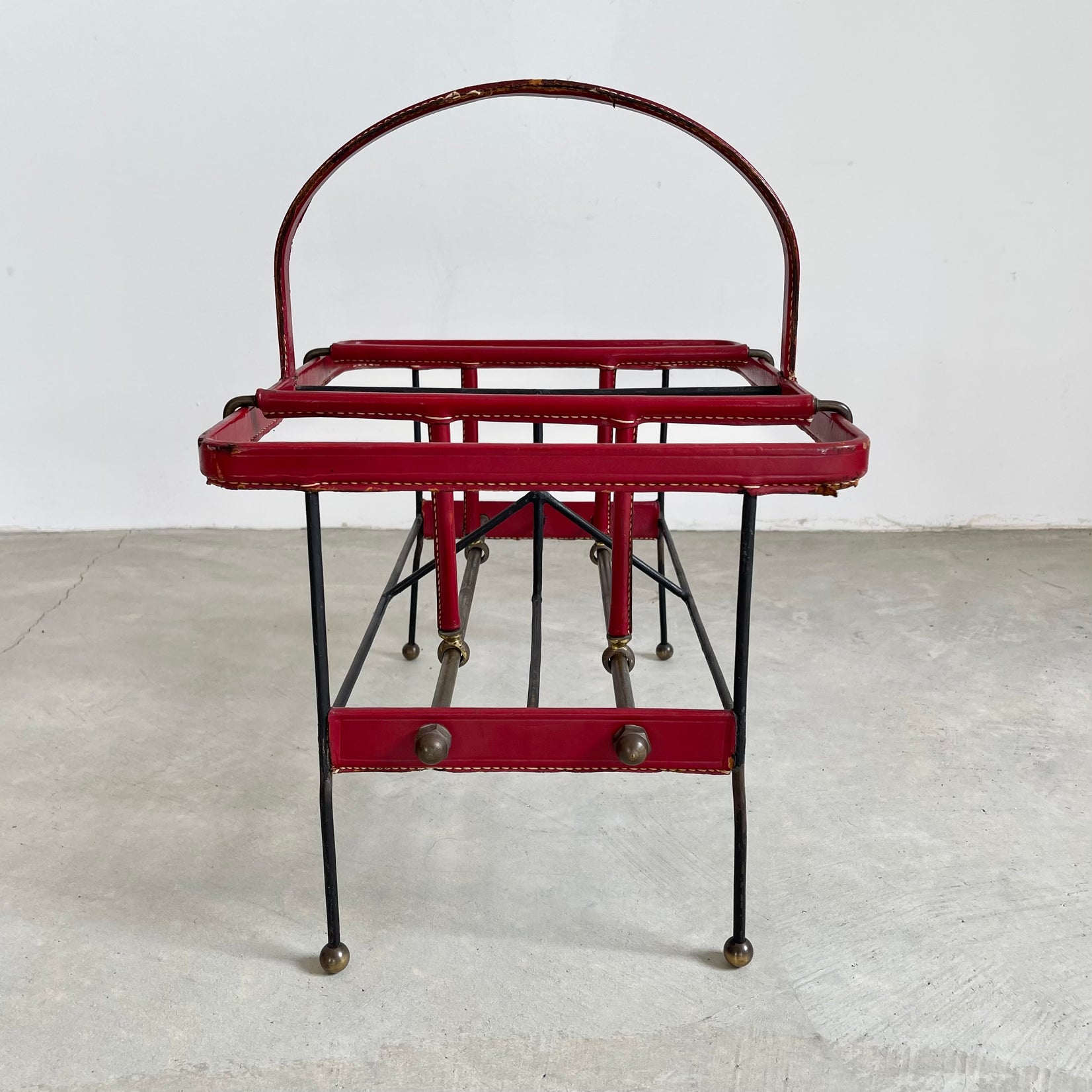 Jacques Adnet Red Leather and Metal Book Rack, 1950s France