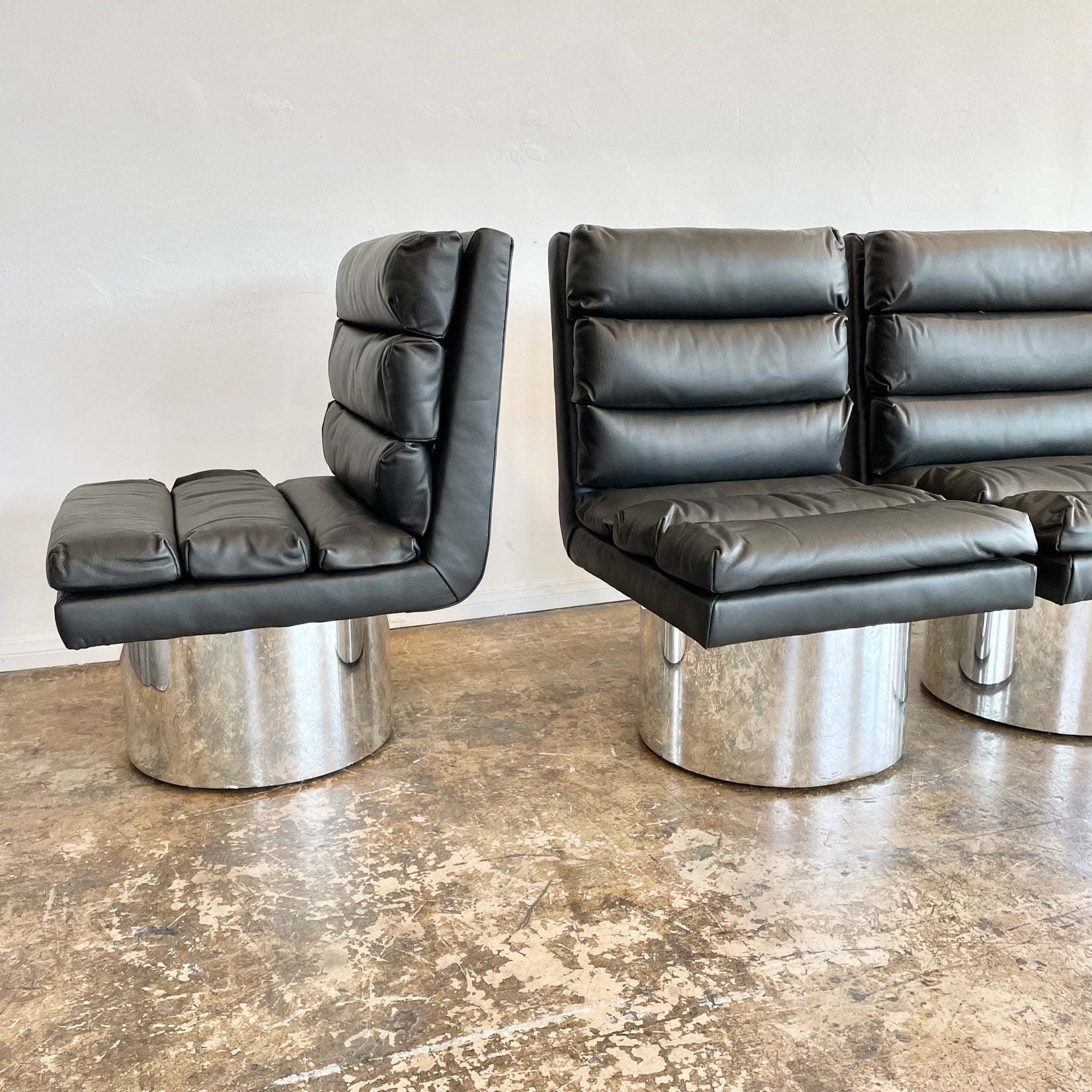 Set of 4 Leather and Chrome Swivel Dining Chairs