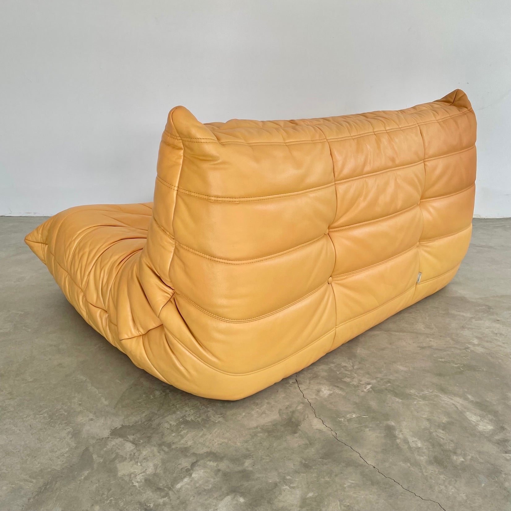 Two Seater Togo Sofa in Yellow Leather by Ligne Roset, 1980s France