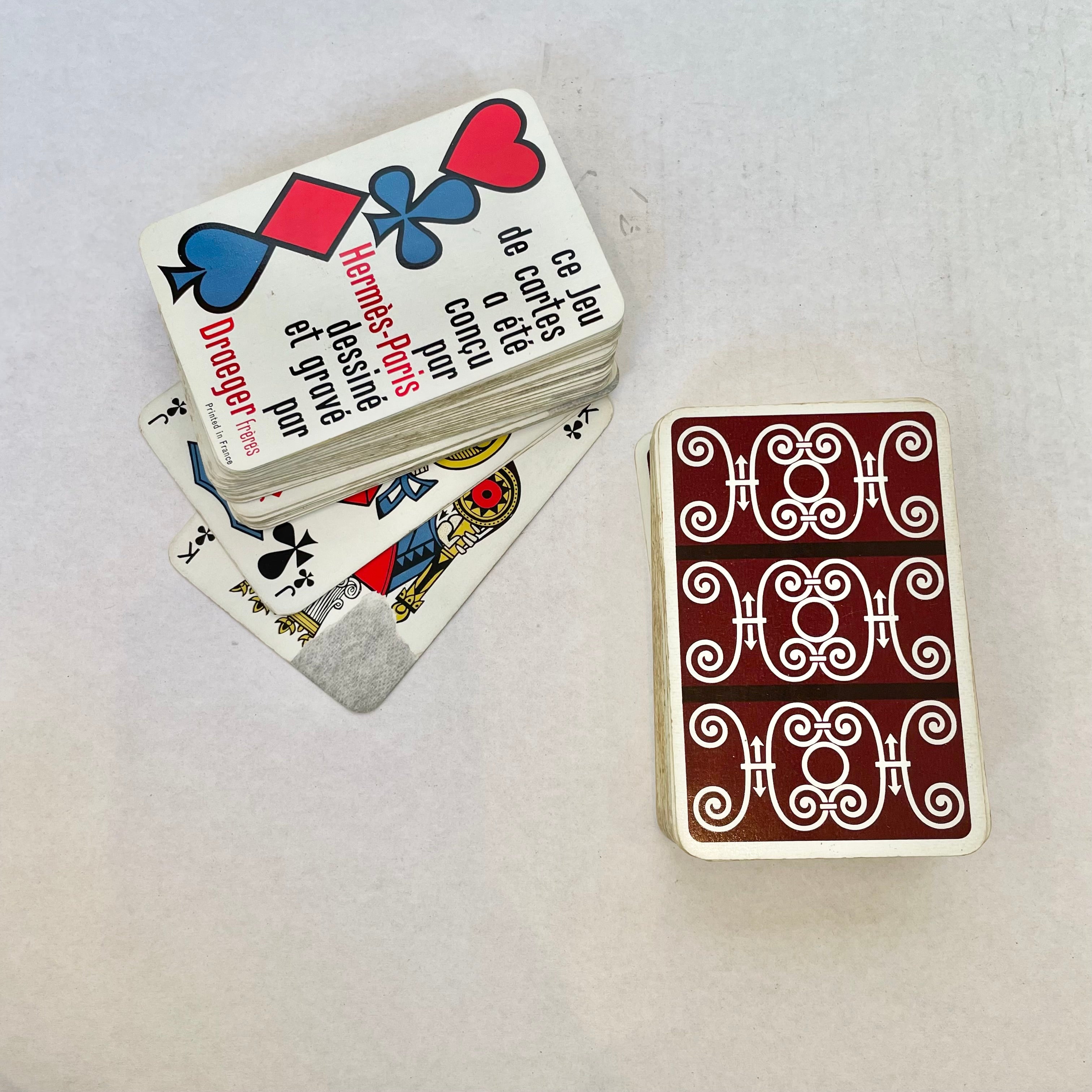 Sold at Auction: TWO PACKS OF HERMES PLAYING CARDS, in an original